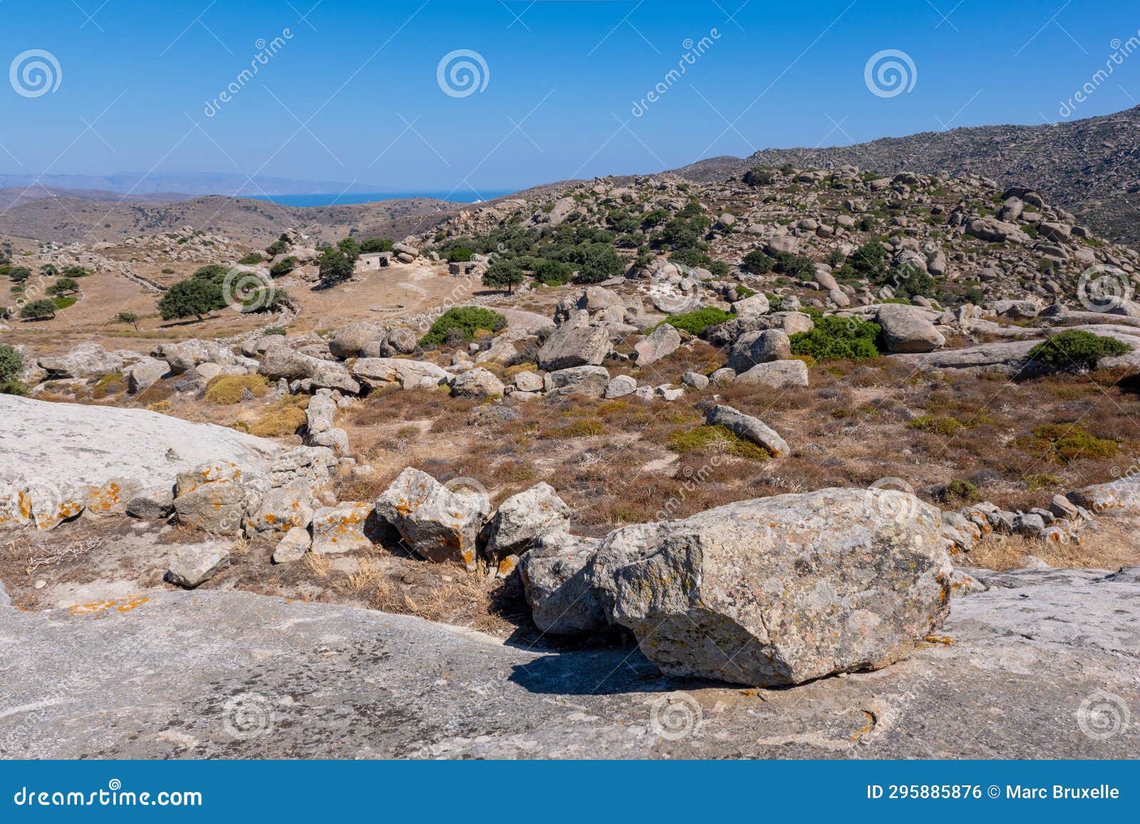 boulders scattered throughout the terrain of volax in tinos