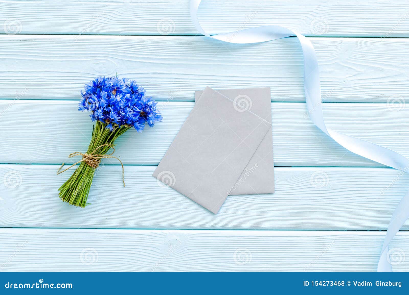 Download Bouquet Of Blue Cornflowers, Envelopes On Mint Green ...