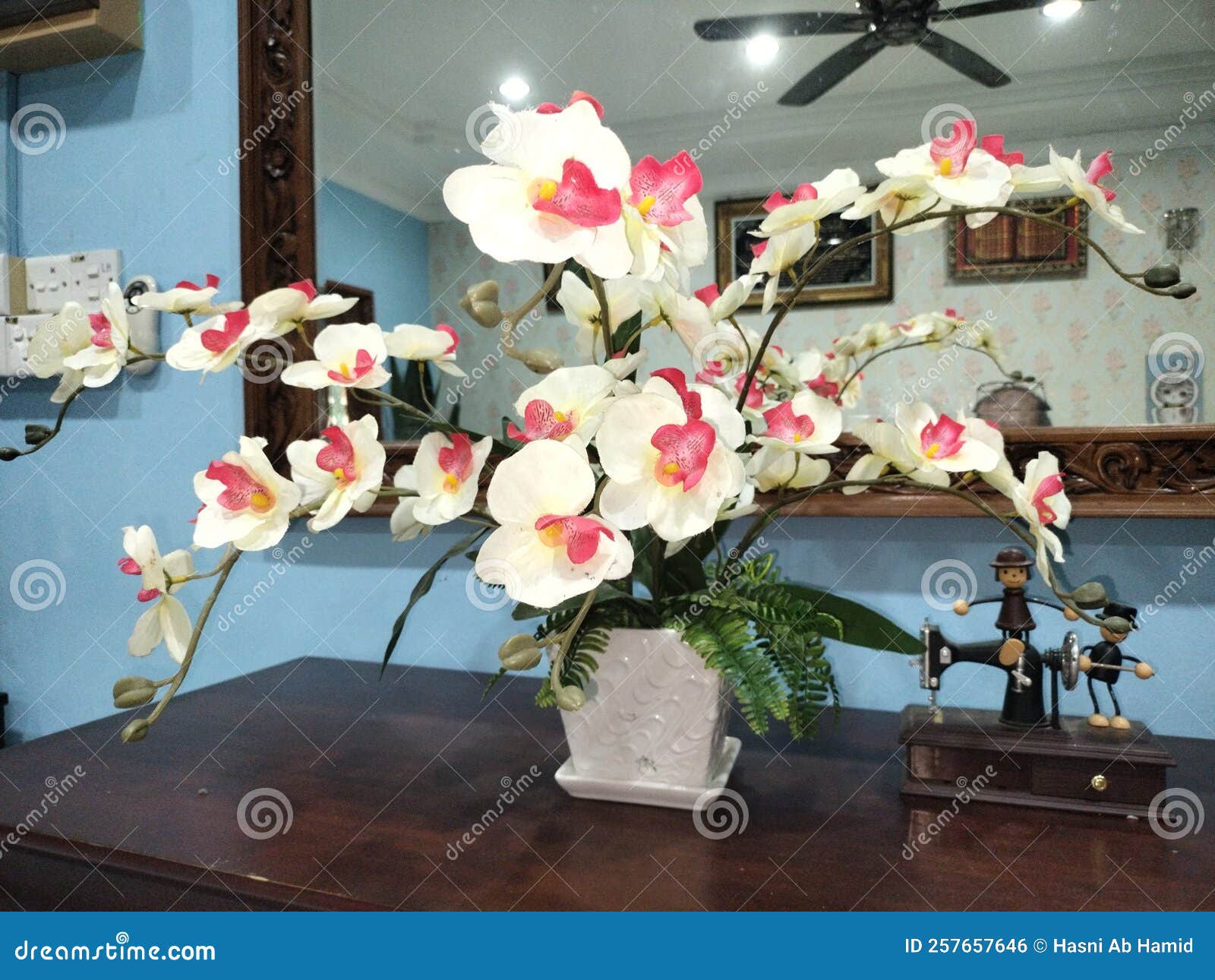 A Bouquet of Flowers Next To Mirror Stock Photo Image of flowers