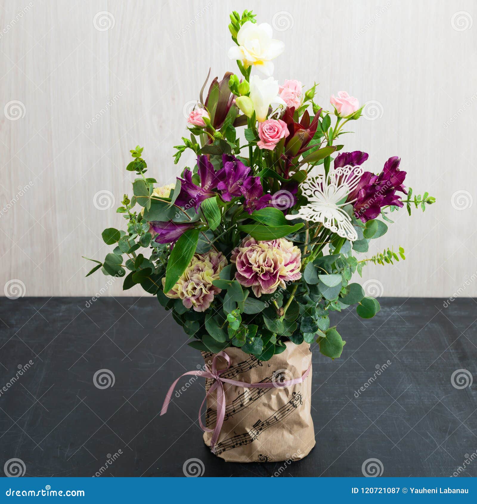 Download Bouquet Of Flowers In Paper Bag Stock Image - Image of arrangement, color: 120721087