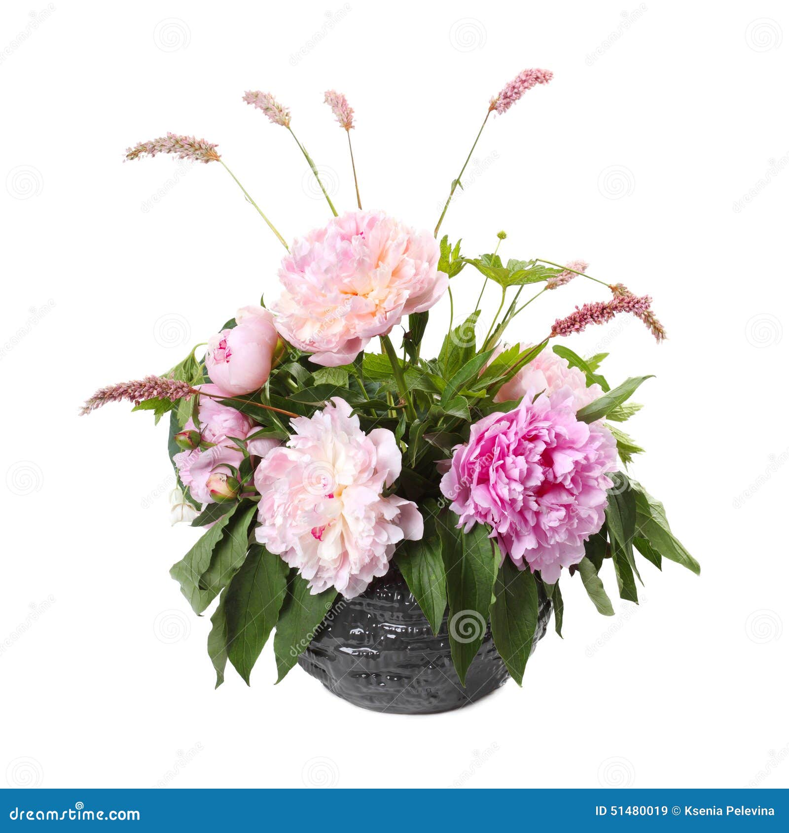 bouquet of pink peonies and sorrel in a vase