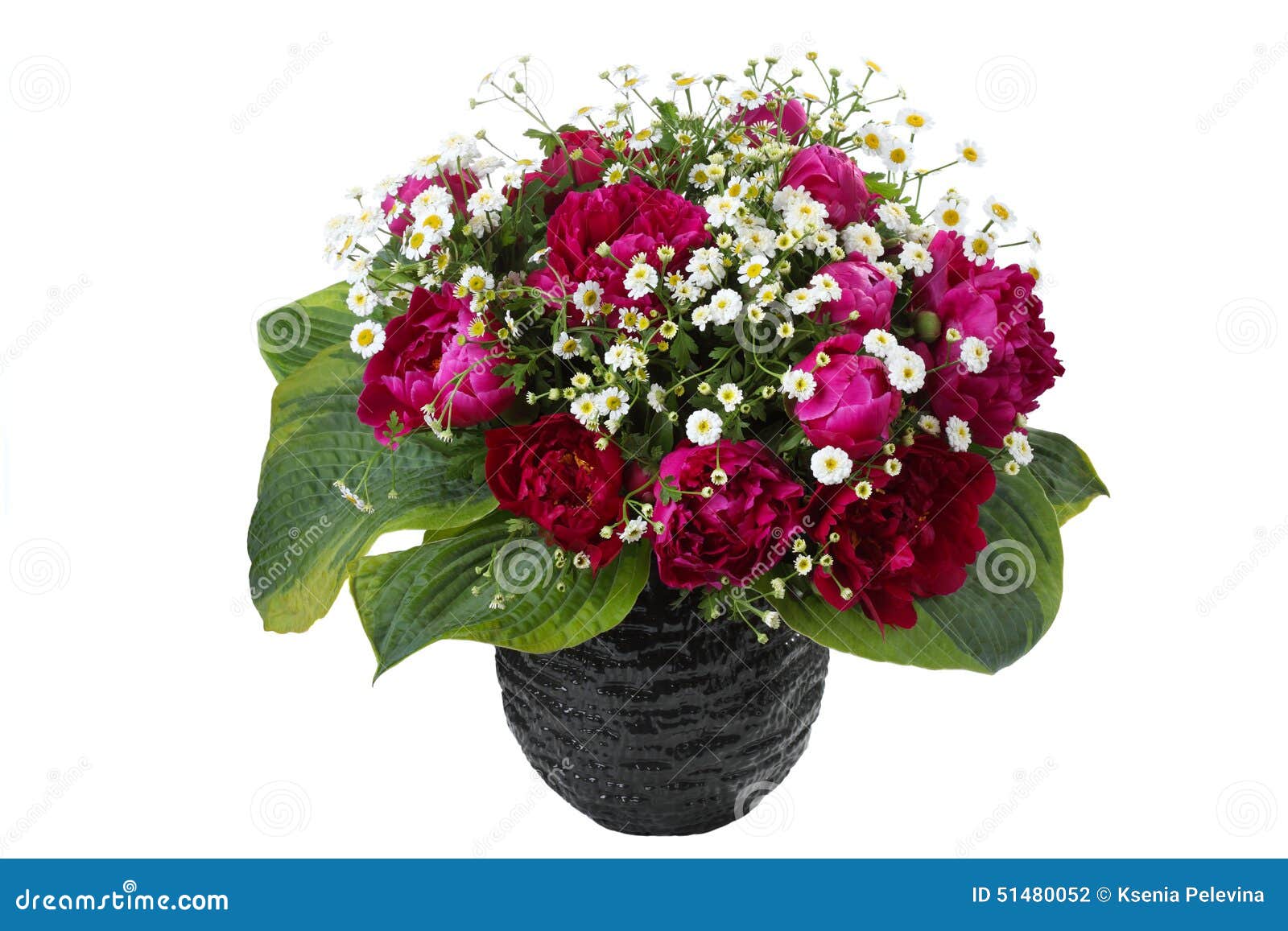 bouquet of pink peonies and sorrel in a vase