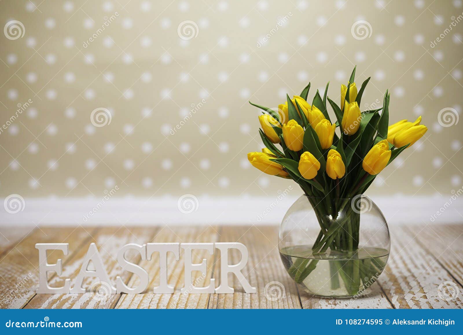 A Bouquet of Yellow Tulips in a Vase on the Floor. a Gift To a W Stock ...