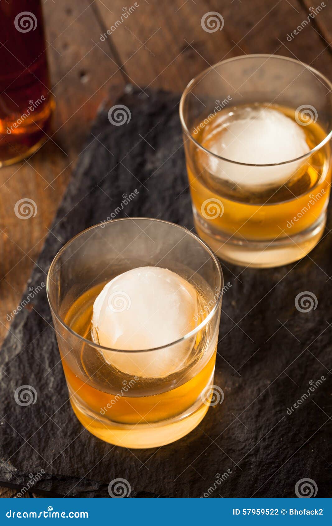 Bourbon Whiskey with a Sphere Ice Cube Stock Photo - Image of cold,  libation: 57959522