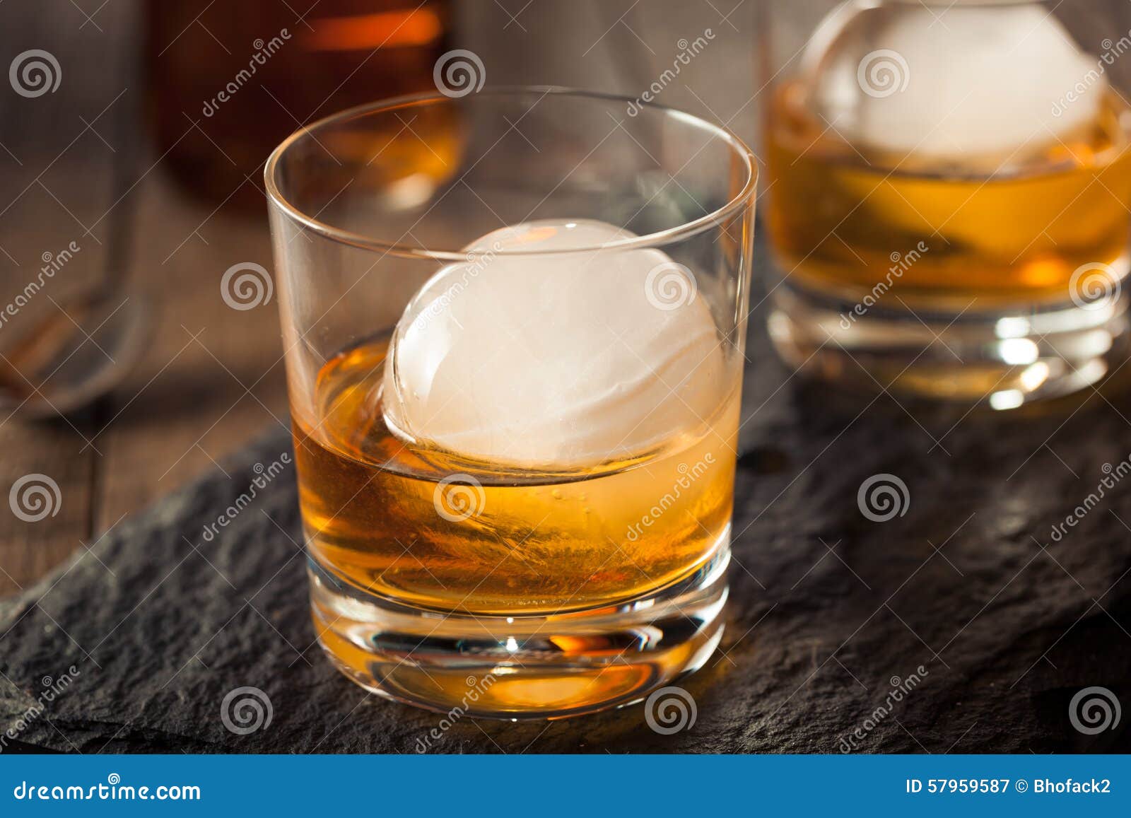 Whiskey With Ice Cubes In Glass Stock Photo, Picture and Royalty Free  Image. Image 12197629.