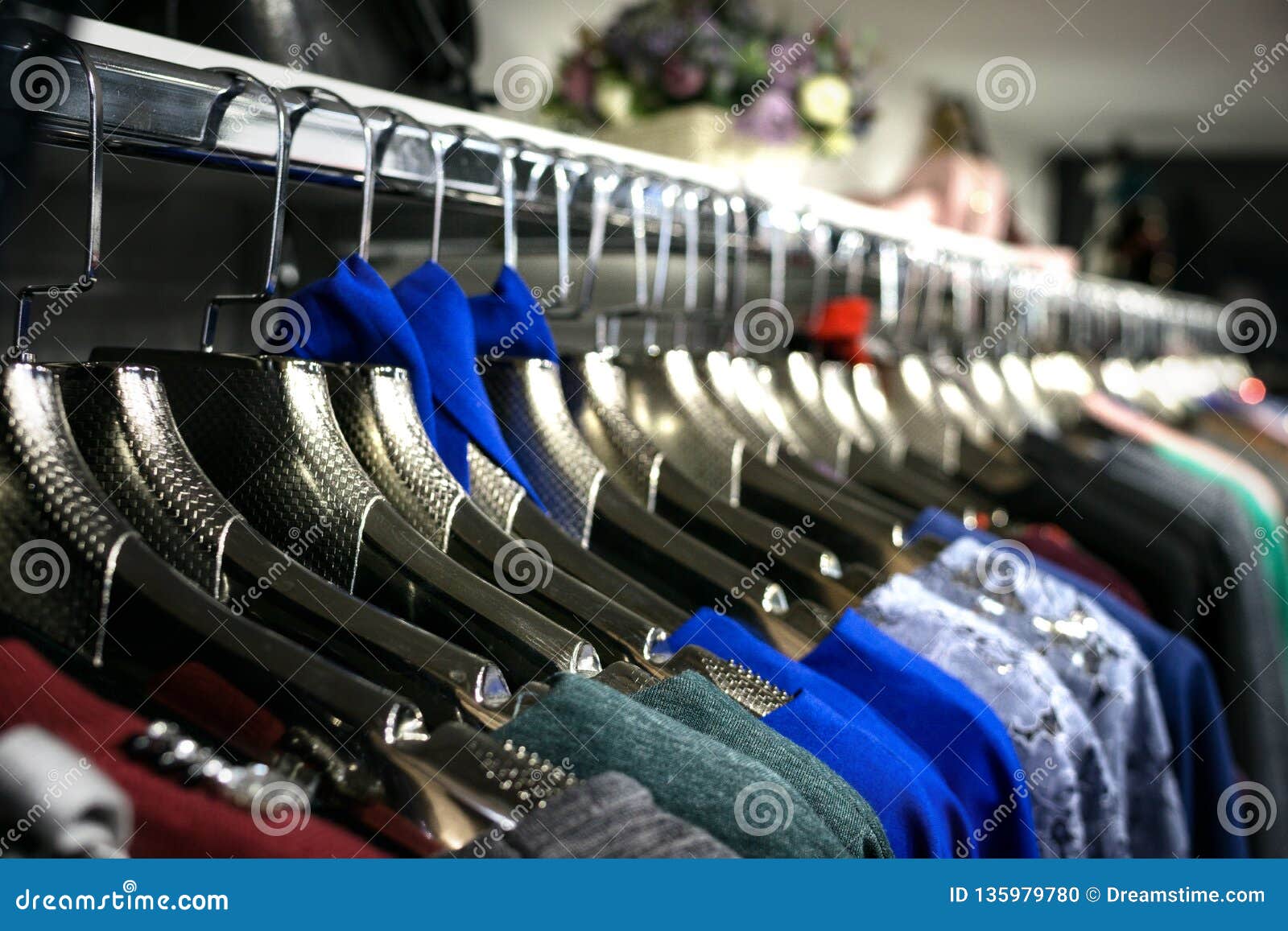 Boutique of Clothes. Dresses in Boutique Weigh on Hangers. Horizontal ...