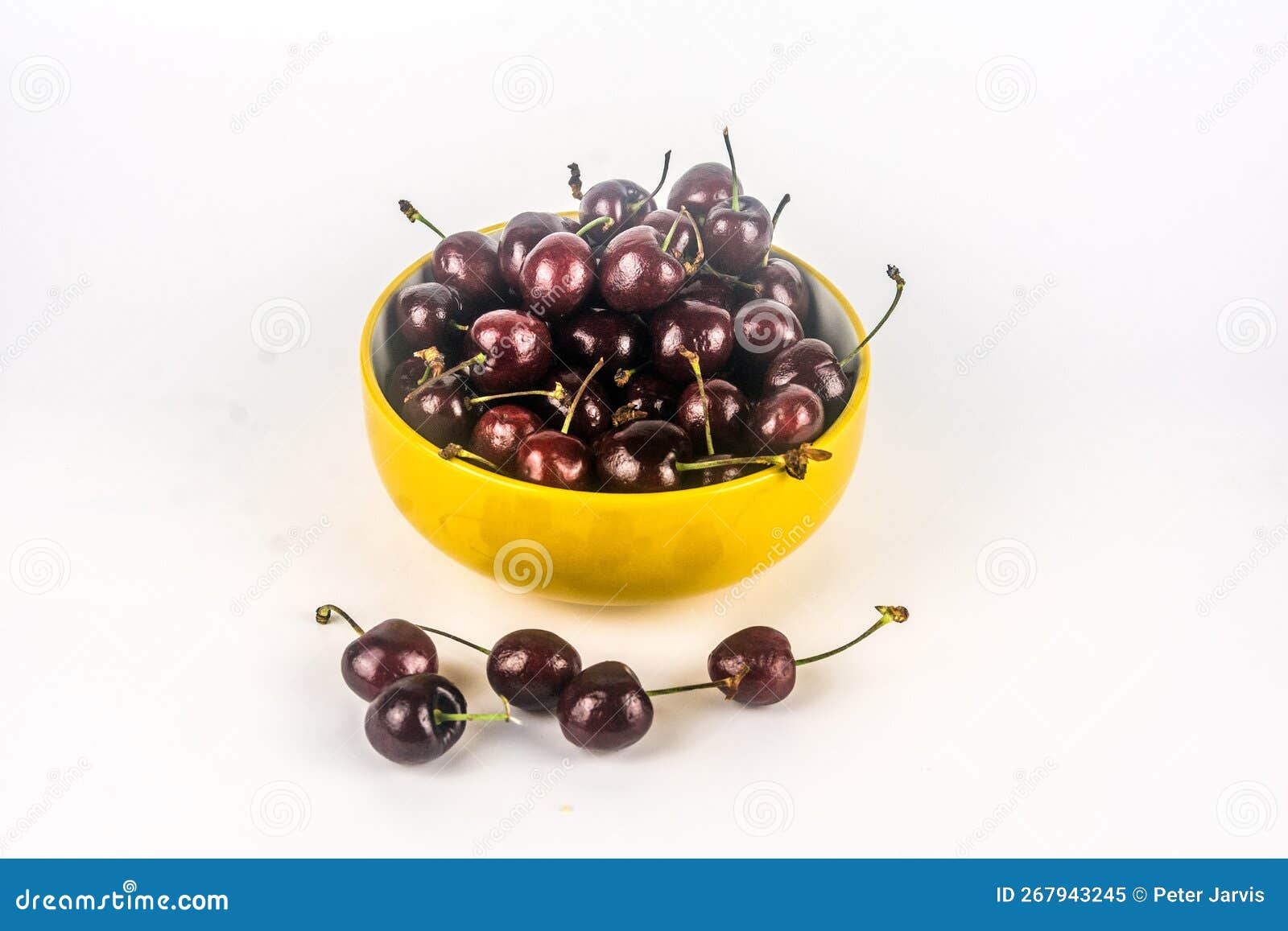 A bowl of black cherries stock image. Image of tasty 267943245