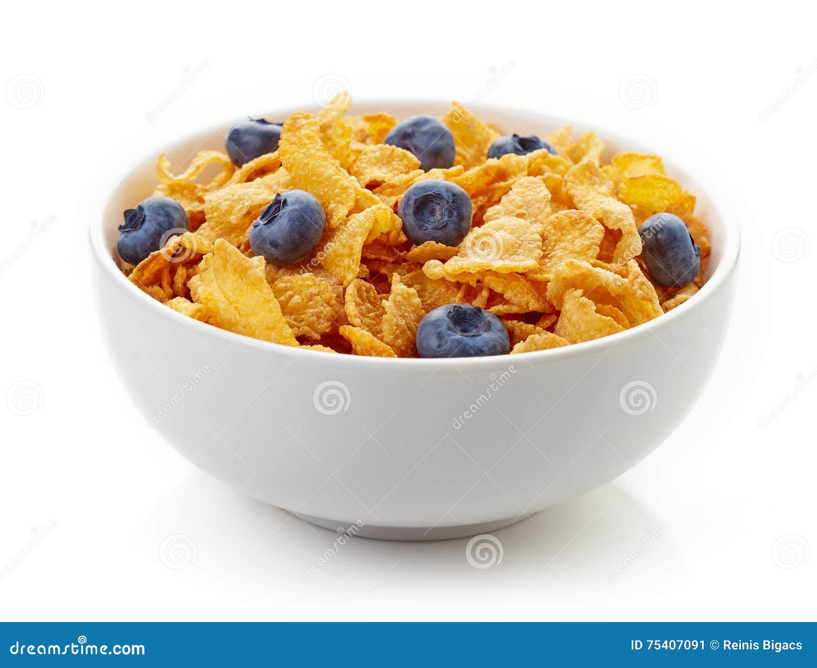 Bowl of Corn Flakes and Blueberries Isolated on White Stock Image