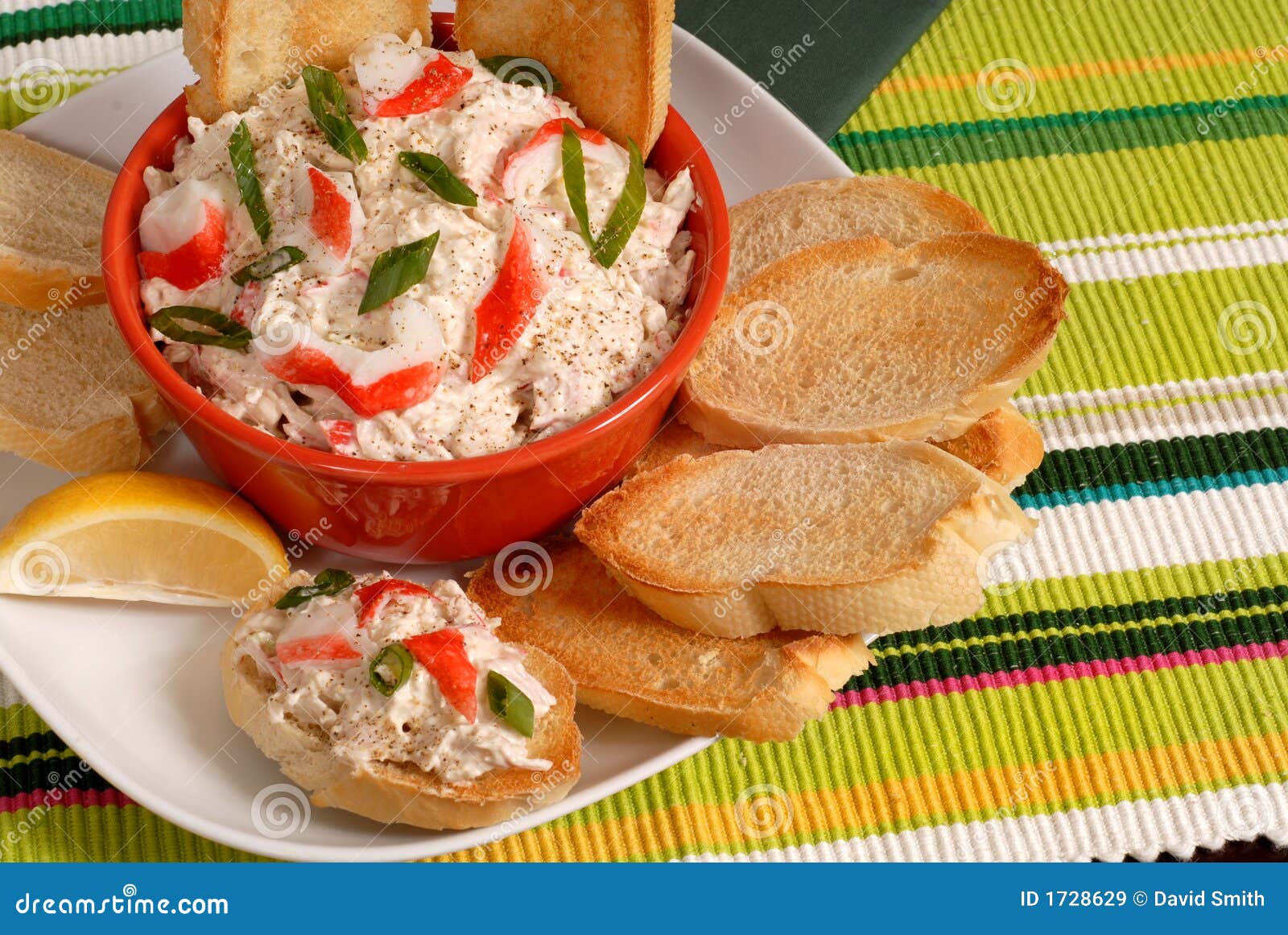 Bowl of Crab Dip with Toasted Crostini and Lemon Stock Image Image of