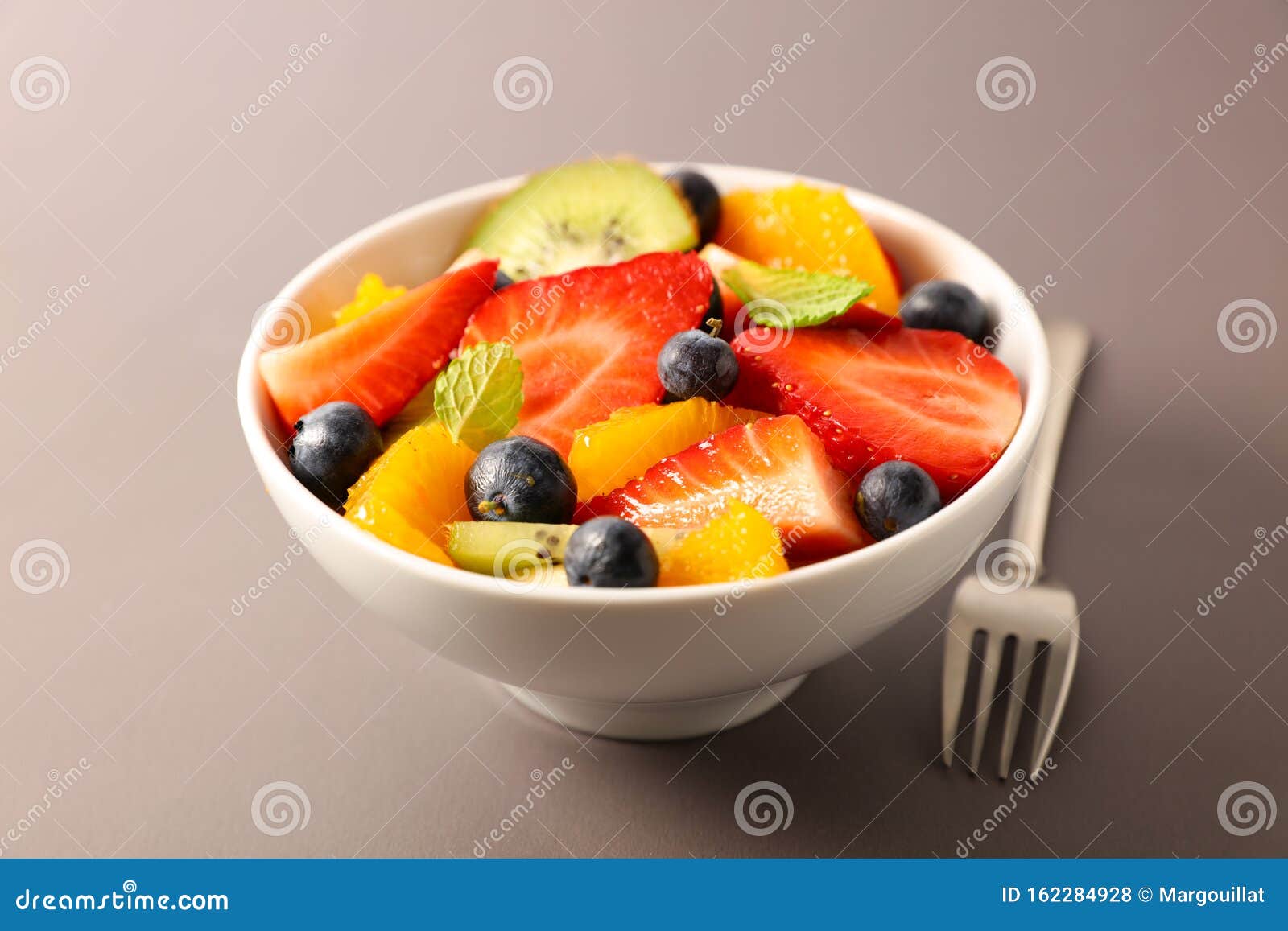 Fruit salad and fork stock photo. Image of fork, healthy 162284928