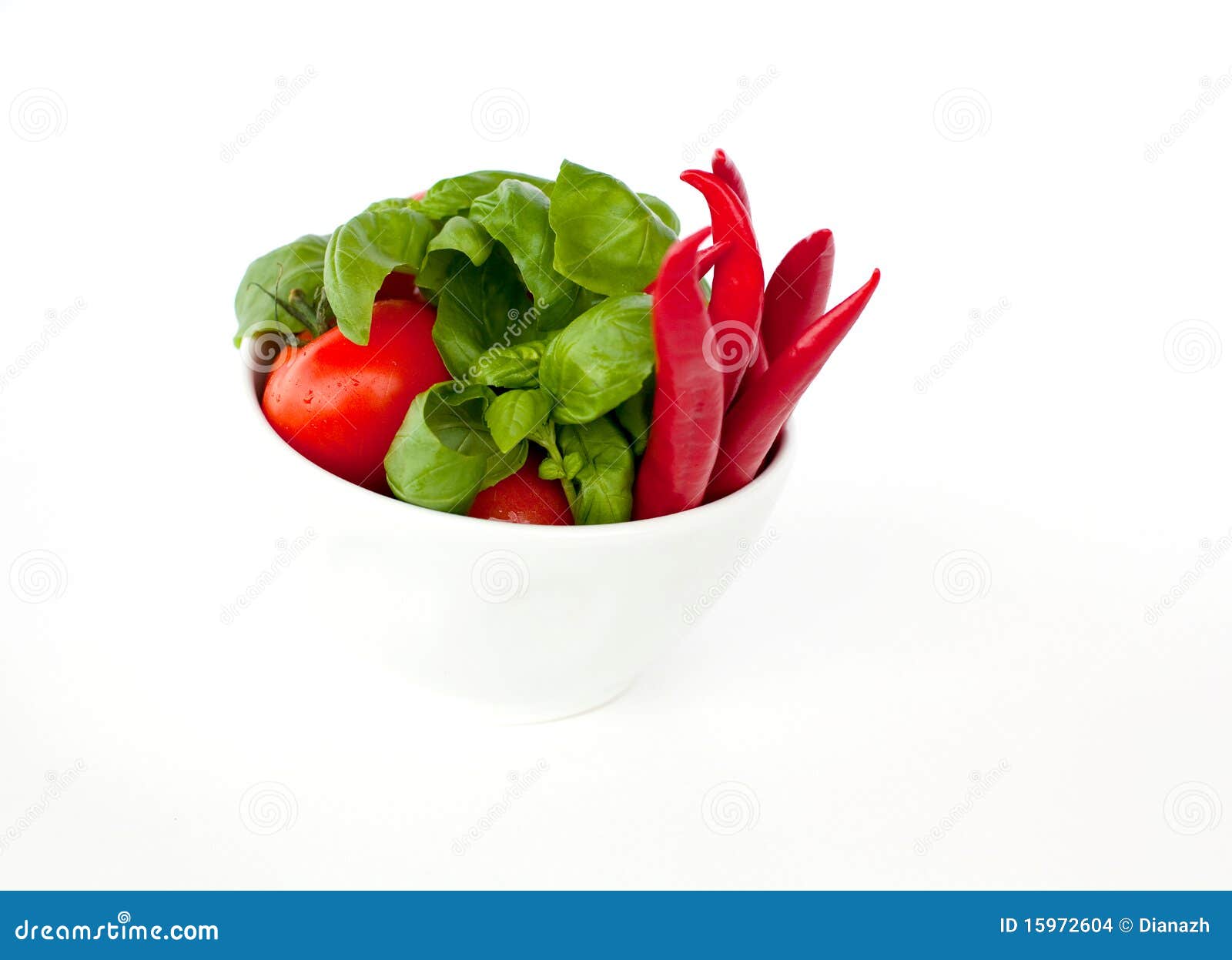 A Bowl Full of Tomatoes, Pepperoni and Basil Stock Photo Image of