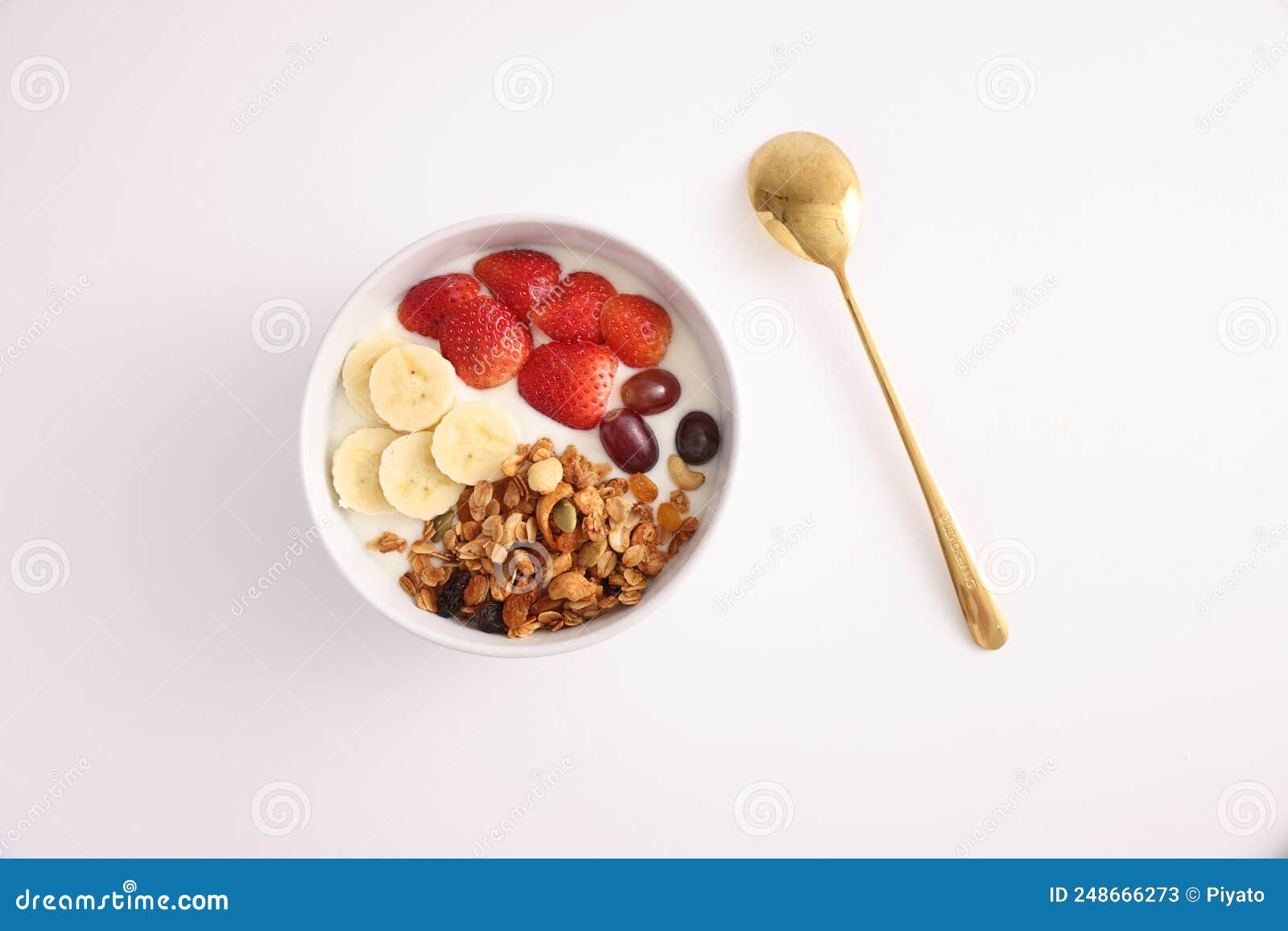 Bowl of Granola Cereal with Yogurt and Berries Isolated on White