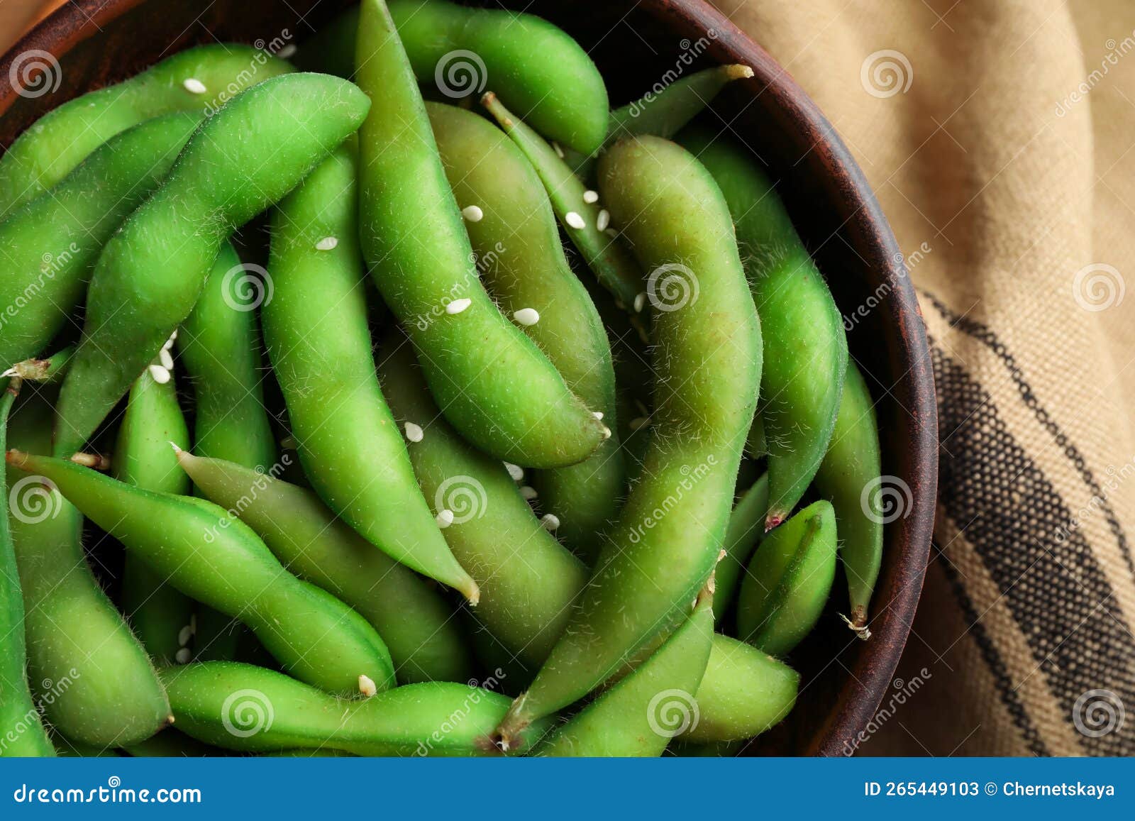 Bowl with Green Edamame Beans in Pods on Table, Top View Stock Image
