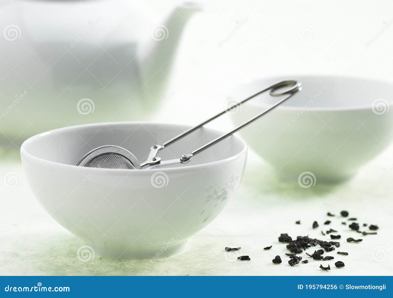 Bowl of Green Tea, Infusion Against White Background Stock Photo