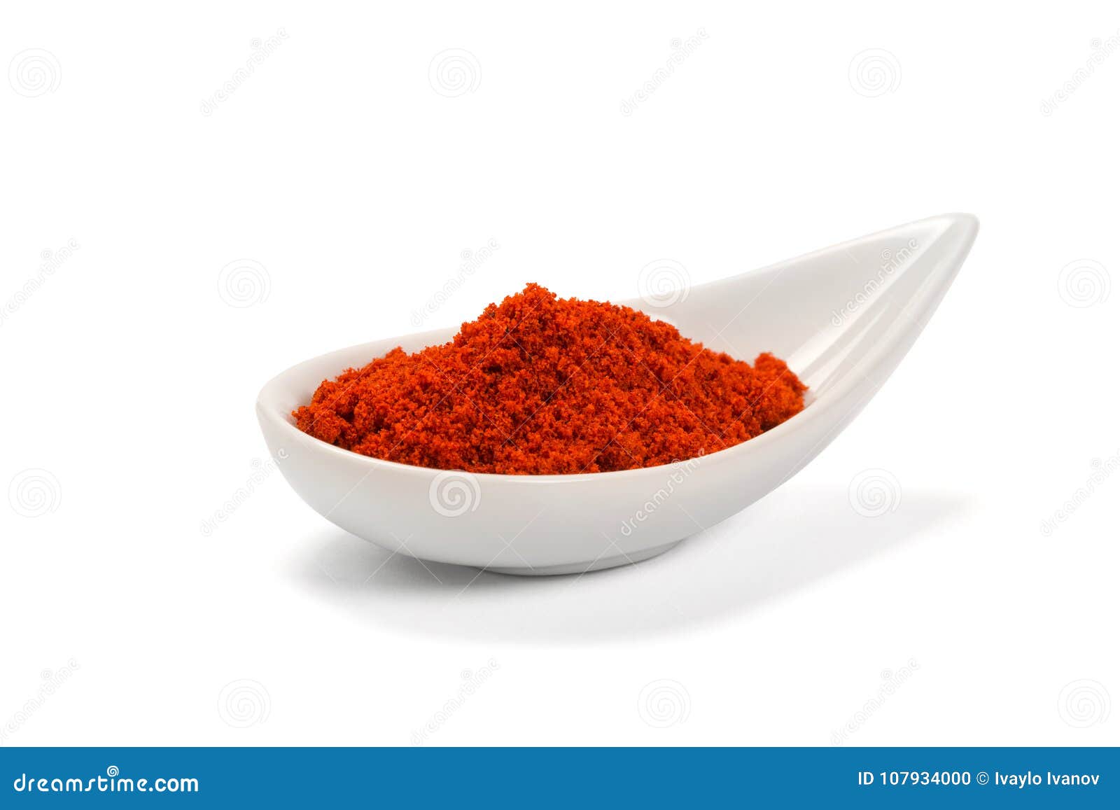 Bowl of Ground Red Pepper Spice in Bowl Isolated on White Stock Photo