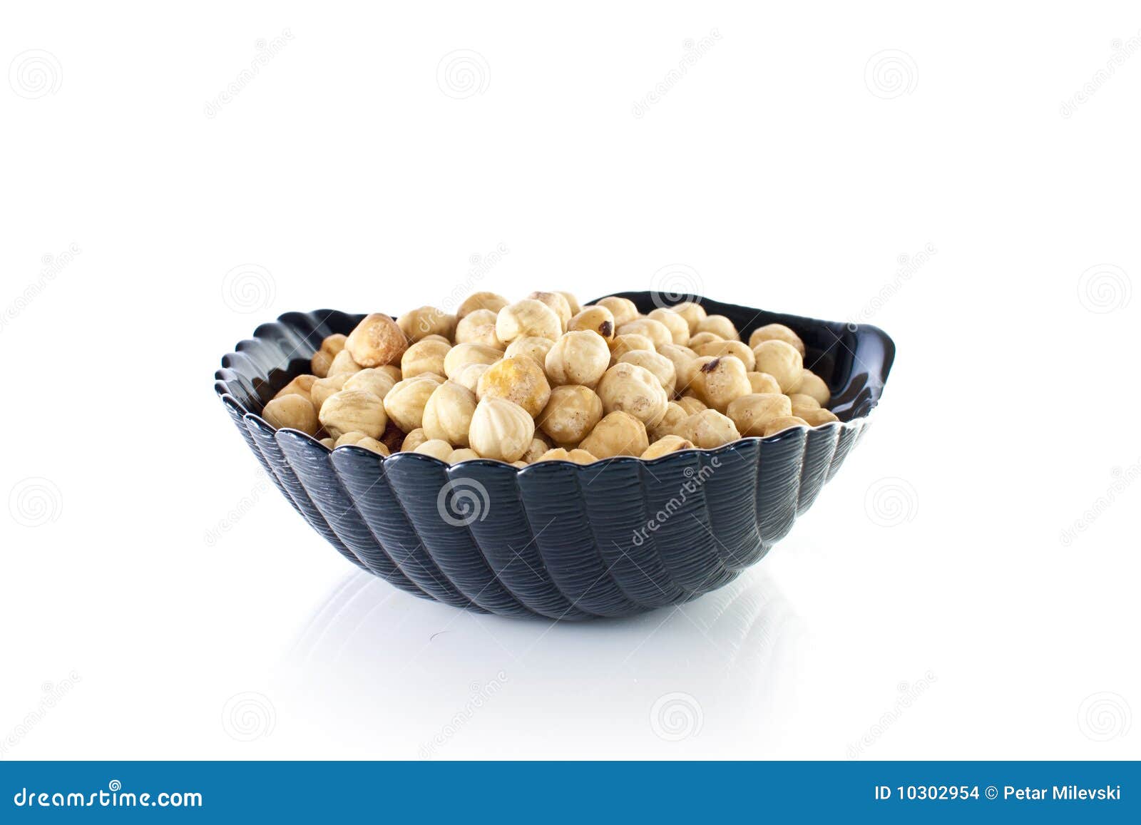 Bowl of macadamia nuts stock photo. Image of crisp, nutrition 10302954