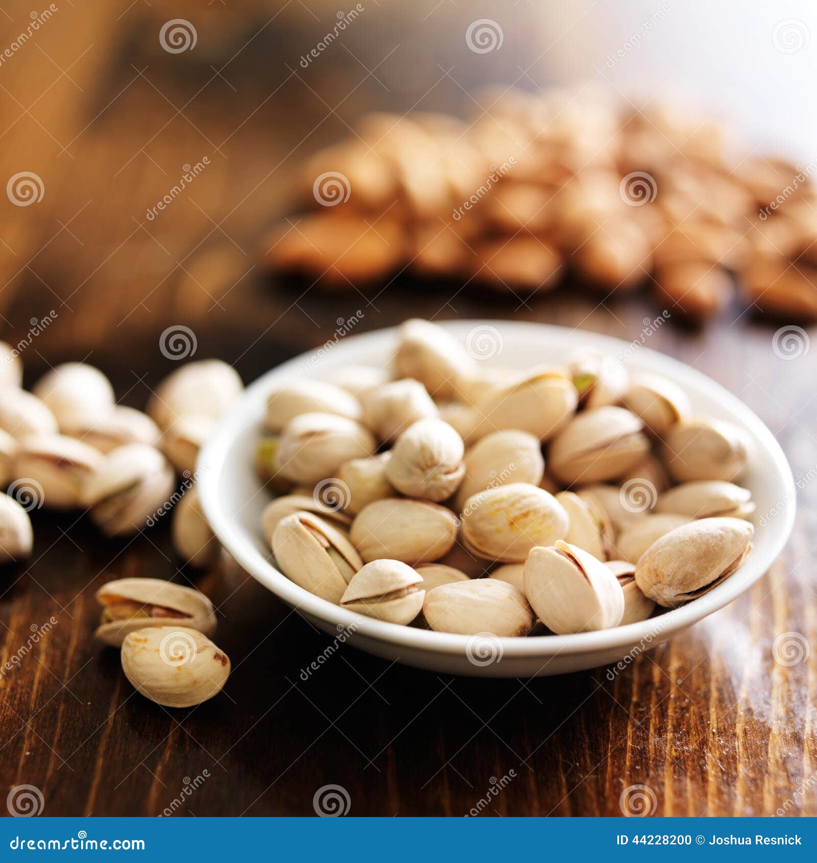 Bowl of macadamia nuts stock photo. Image of nuts, light 44228200