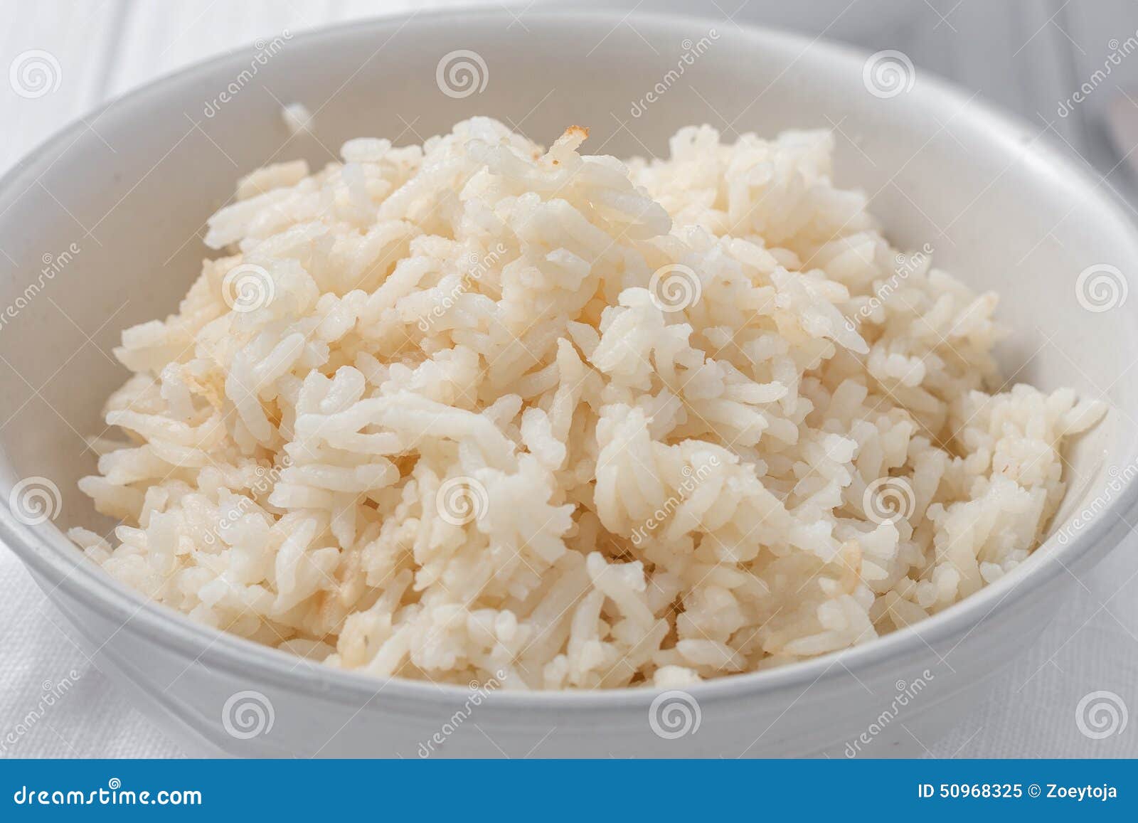 A Bowl of Rice Cooked in Chicken Stock Stock Image - Image of closeup