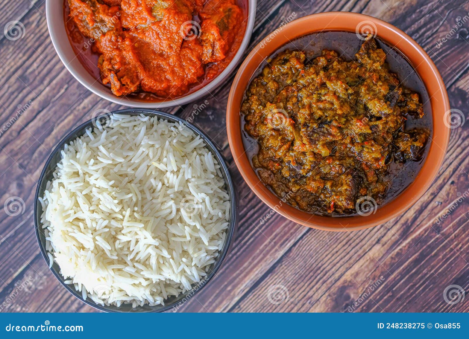 Bowl of Rice Served with Ofada and Pepper Tomato Stew Stock Image