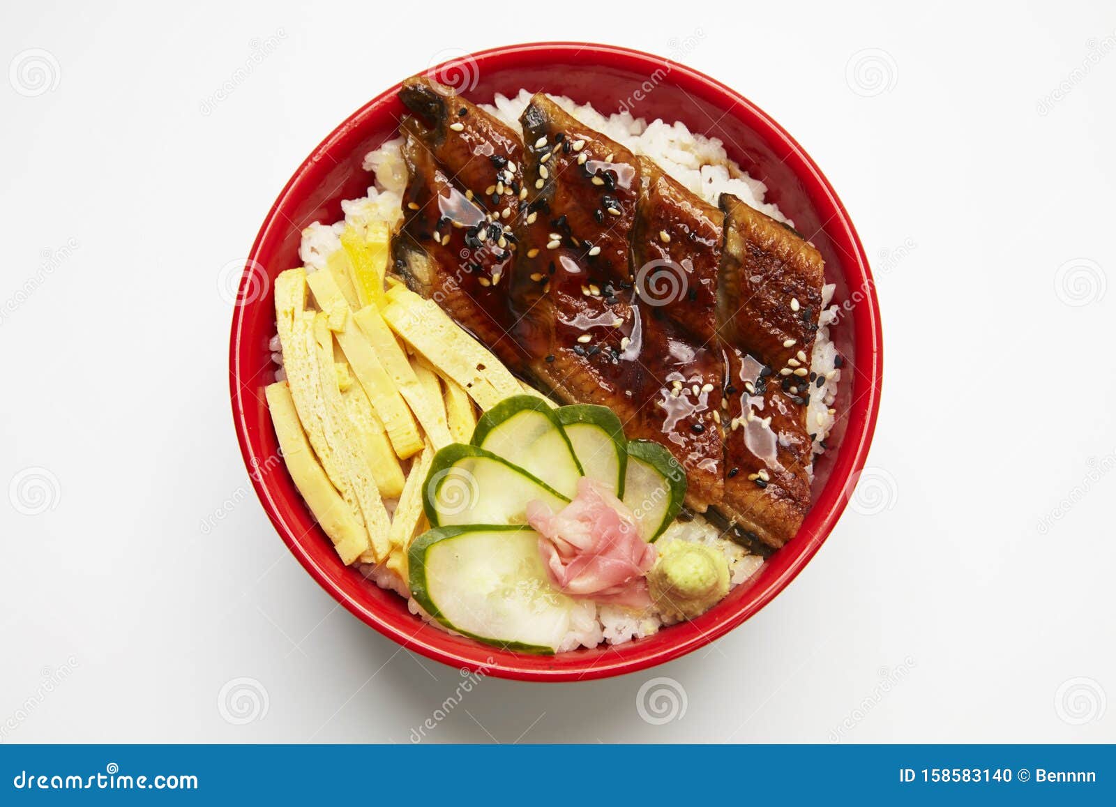 bowl of rice topped with broiled eel in unagi sauce