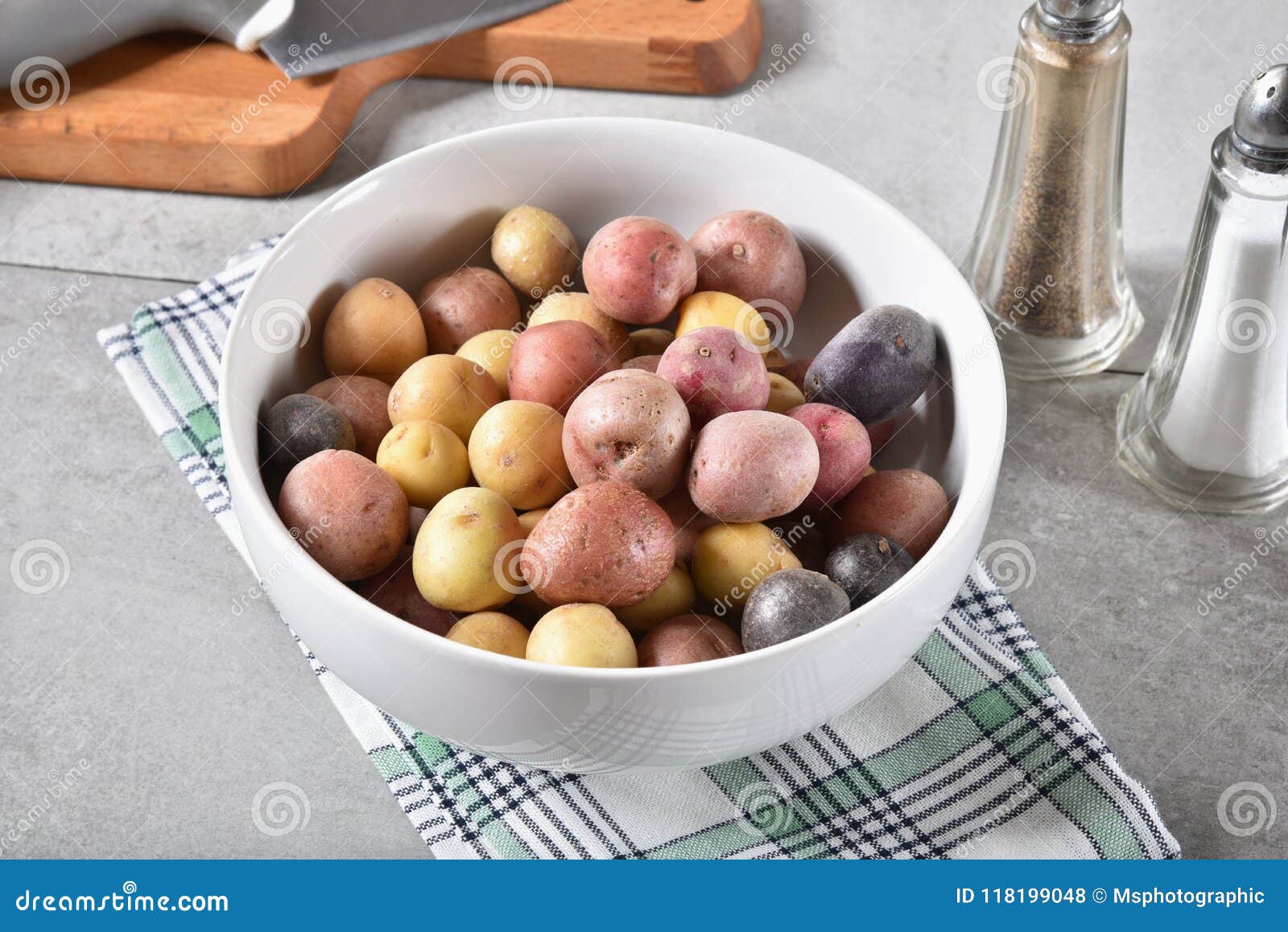 Bowl of tiny potatoes stock photo. Image of vegetable 118199048