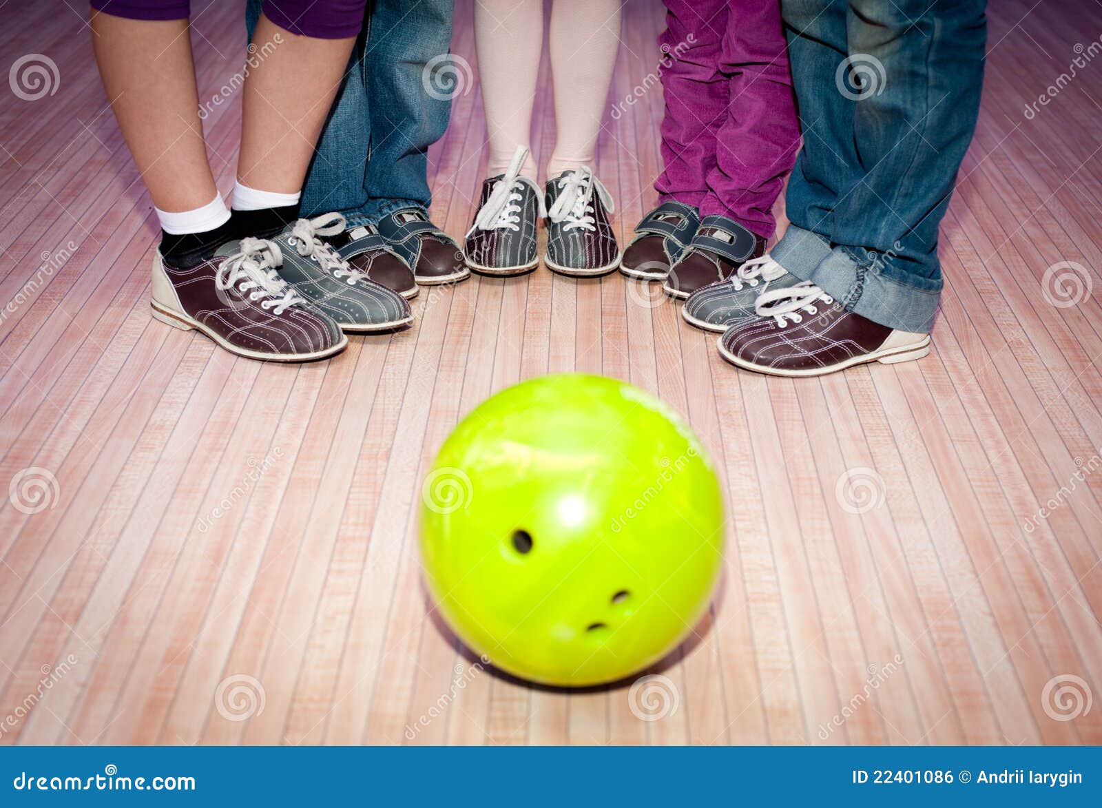 Closeup Of Bowling Shoes And Neon Green Ball Stock Photo