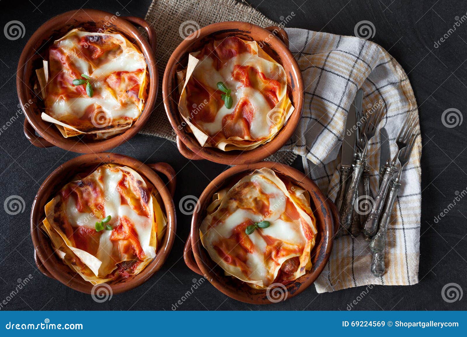 Bowls with Lasagna stock image. Image of basil, pasta 69224569