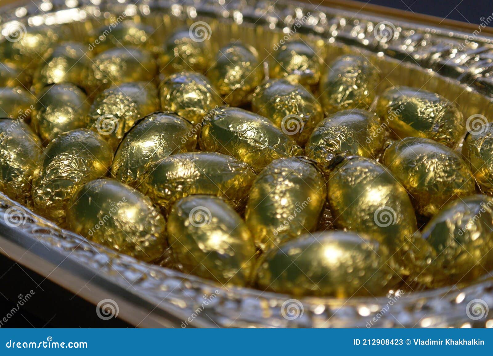 Box of Chocolates in Gold Foil Stock Image Image of wrapped, foil