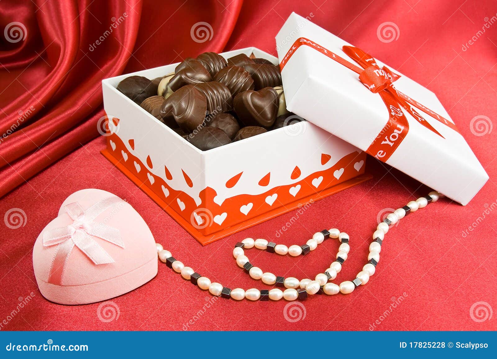 Box of Chocolates with Present and Pearls. Stock Photo Image of
