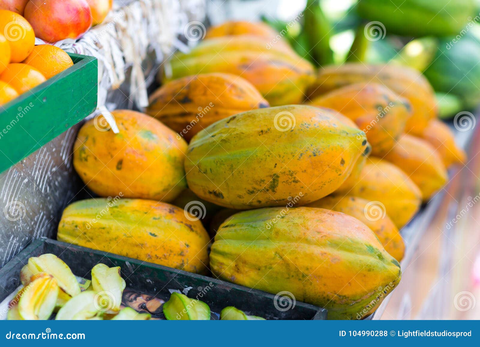 Box of papayas on market stock photo. Image of nutrition 104990288