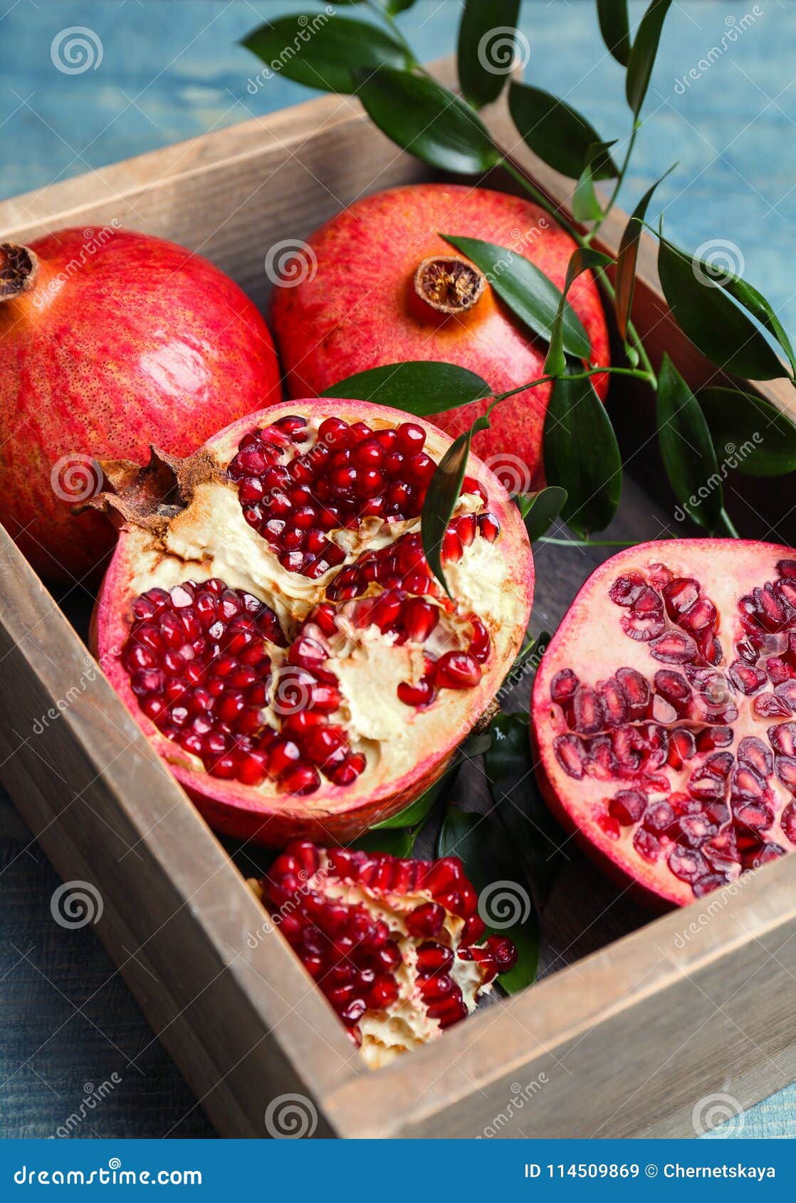 box with pomegranates