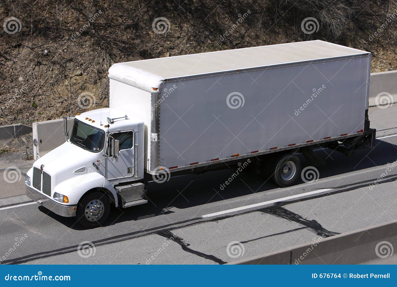 Box Truck on Highway stock photo. Image of panel, semi 676764