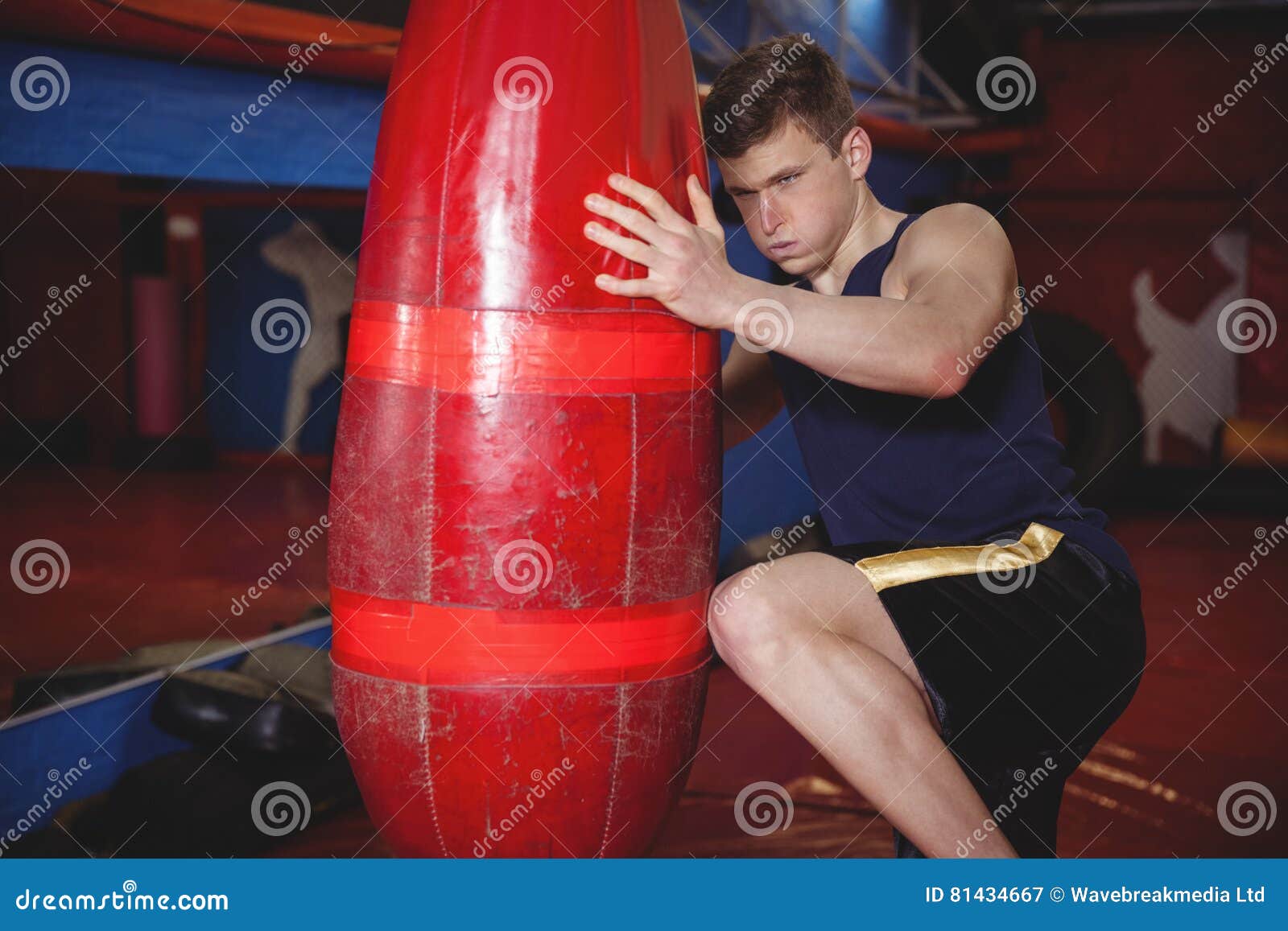 Boxer lifting punching bag stock image. Image of fitness 81434667