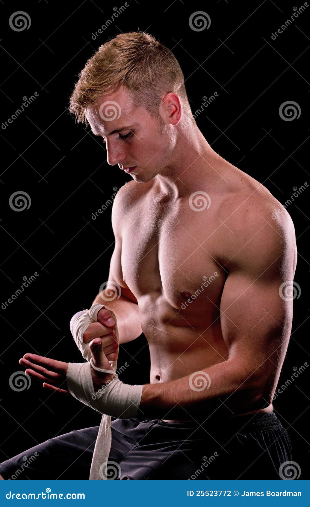 Boxer wrapping his hands stock photo. Image of sports 25523772