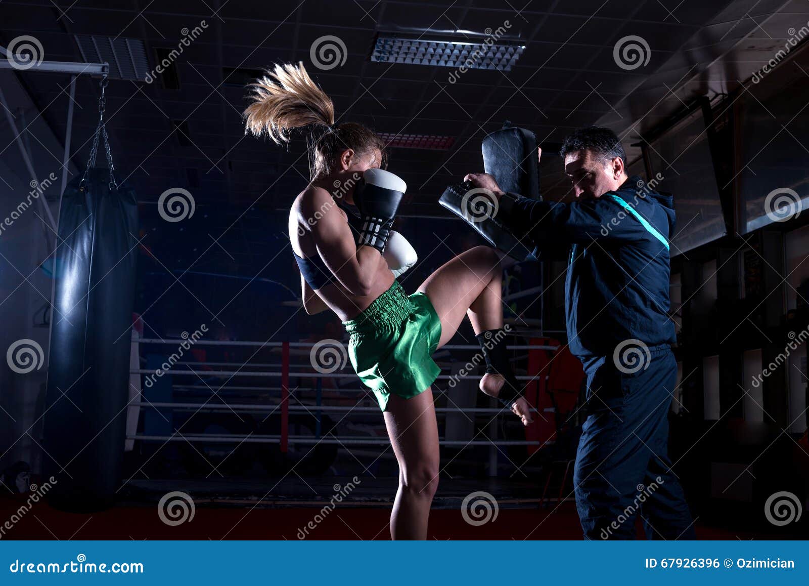 Boxing Girl Doing Knee Kick Stock Photo Image of beautiful, boxer