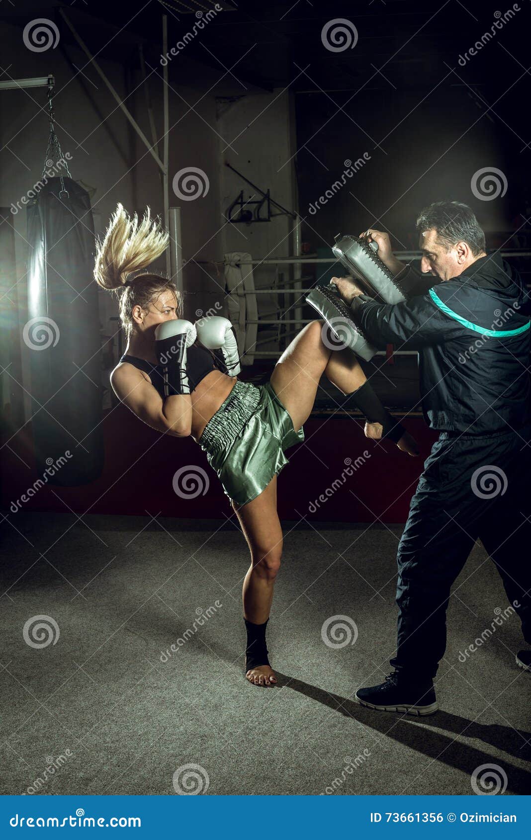 Boxing Girl Doing Knee Kick Stock Photo Image of defense, background