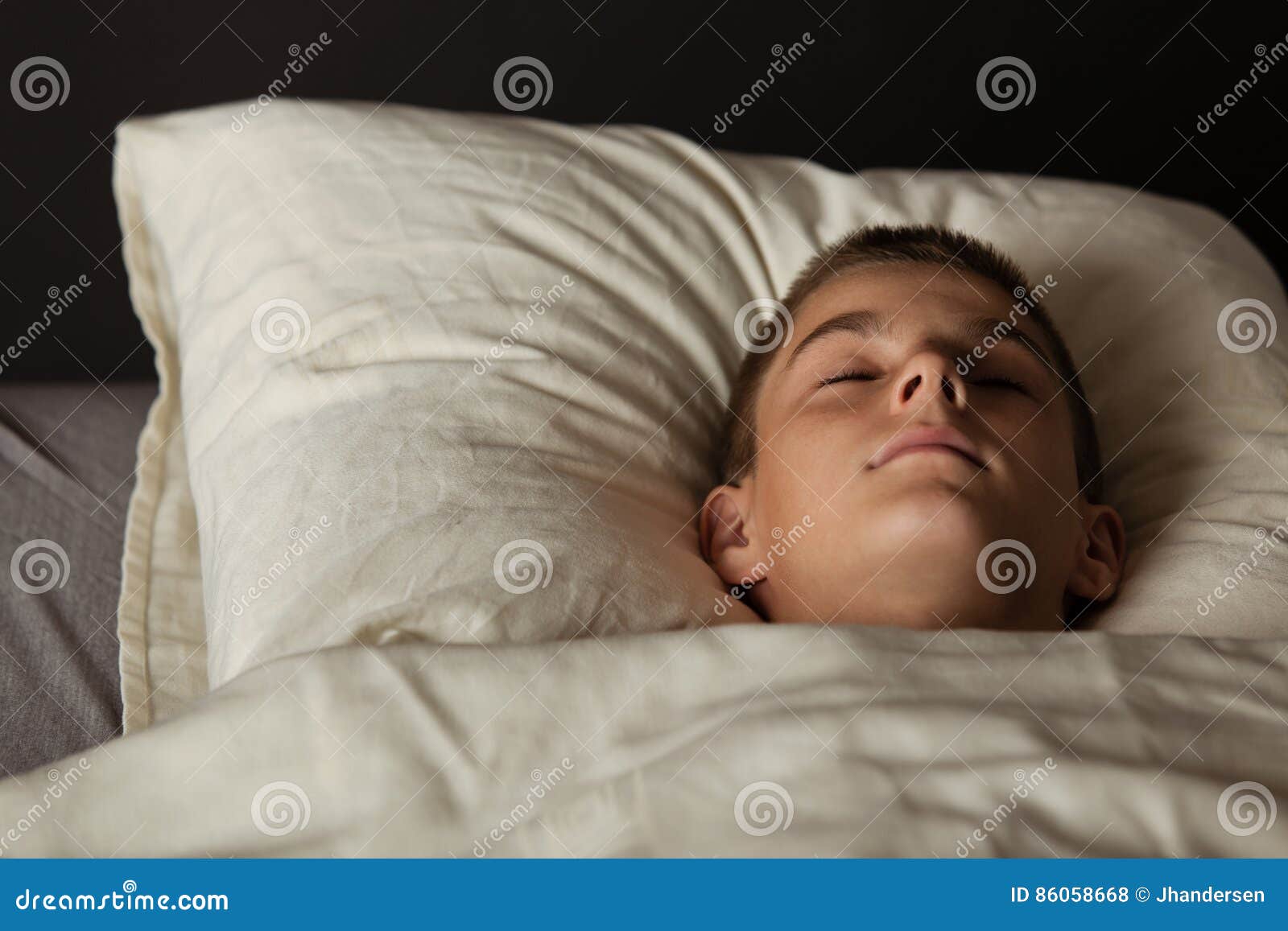 Boy Asleep in Bed with Head on Pillow Stock Photo Image of