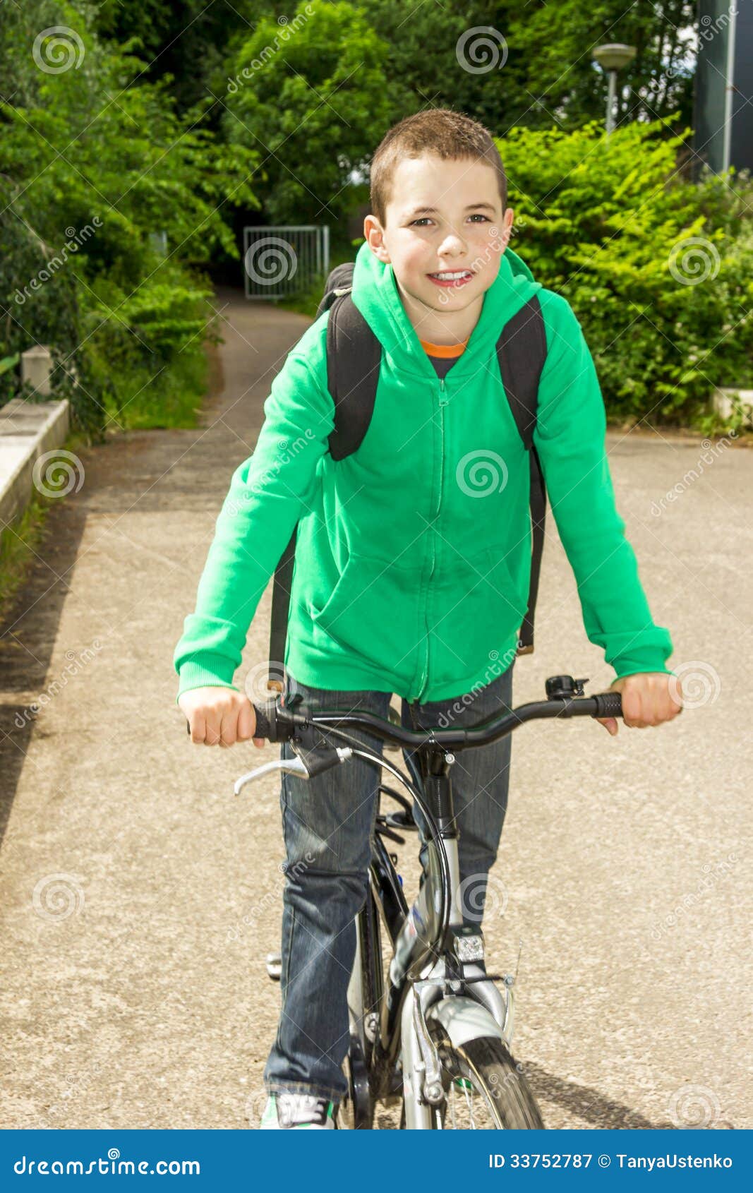 Boy with Backpack on a Bicycle Stock Image Image of schoolboy