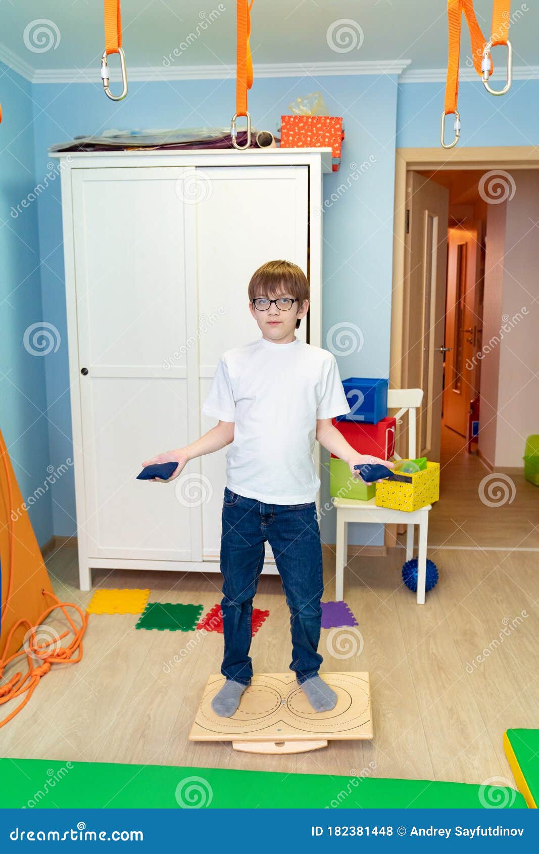 boy on balancing platform sensory integration