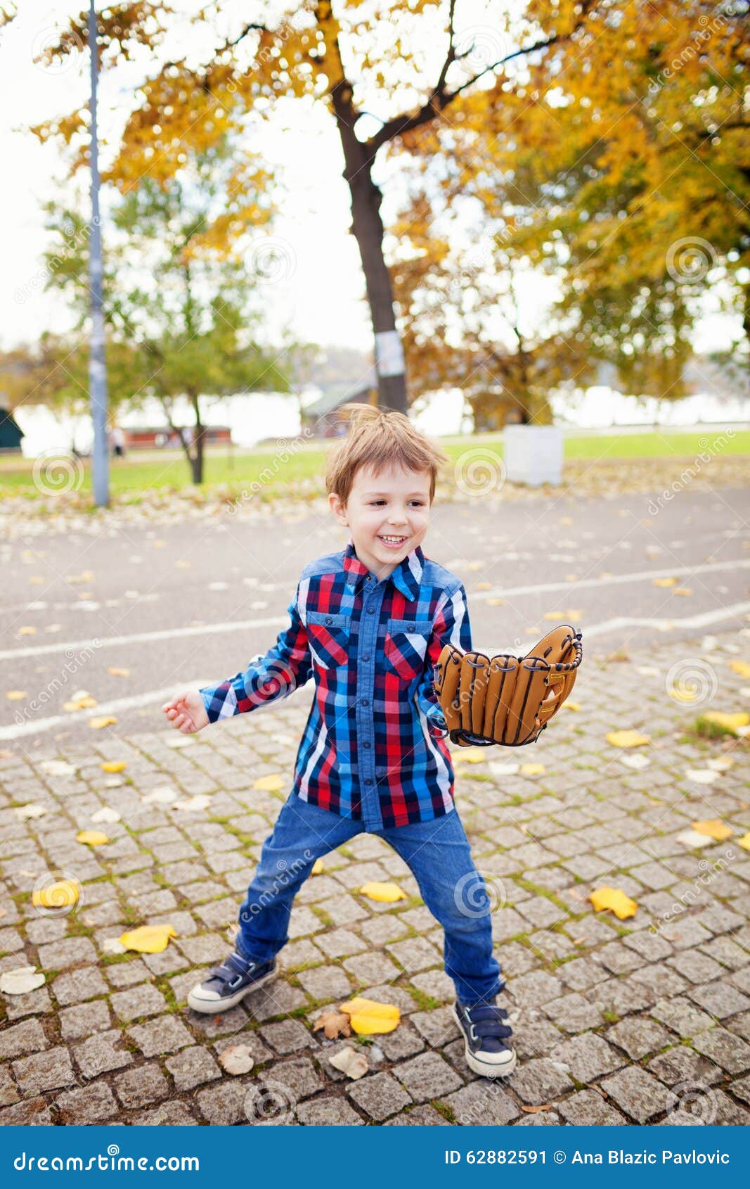 Boy with a baseball glove stock image. Image of family 62882591