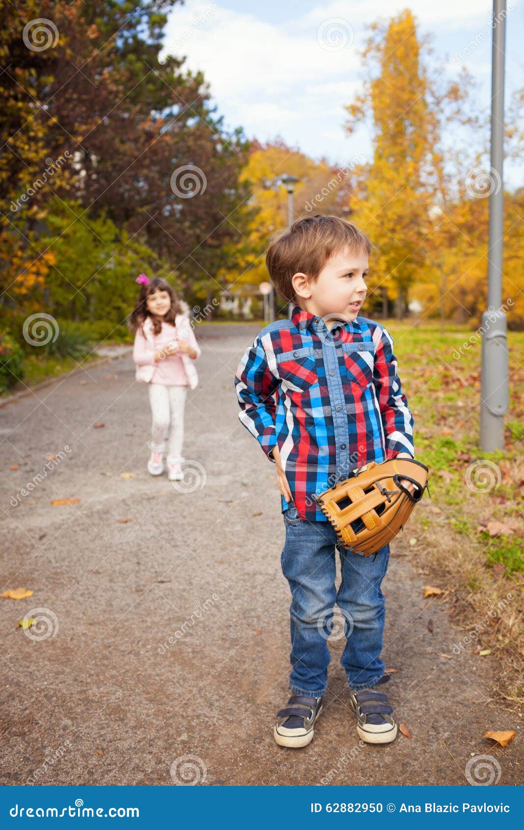Boy with a baseball glove stock photo. Image of family 62882950
