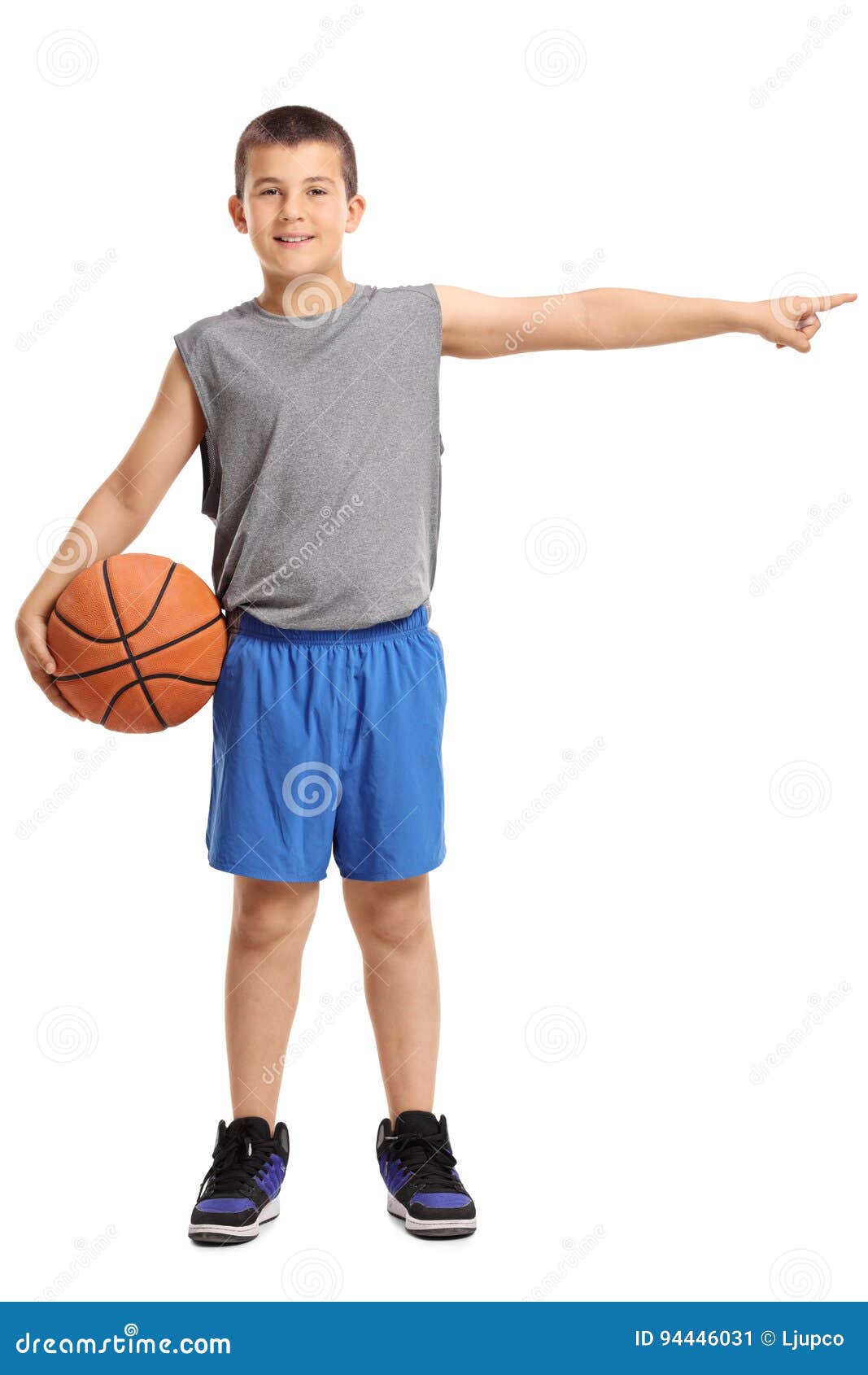 Boy with a Basketball Pointing Right Stock Image - Image of posing ...