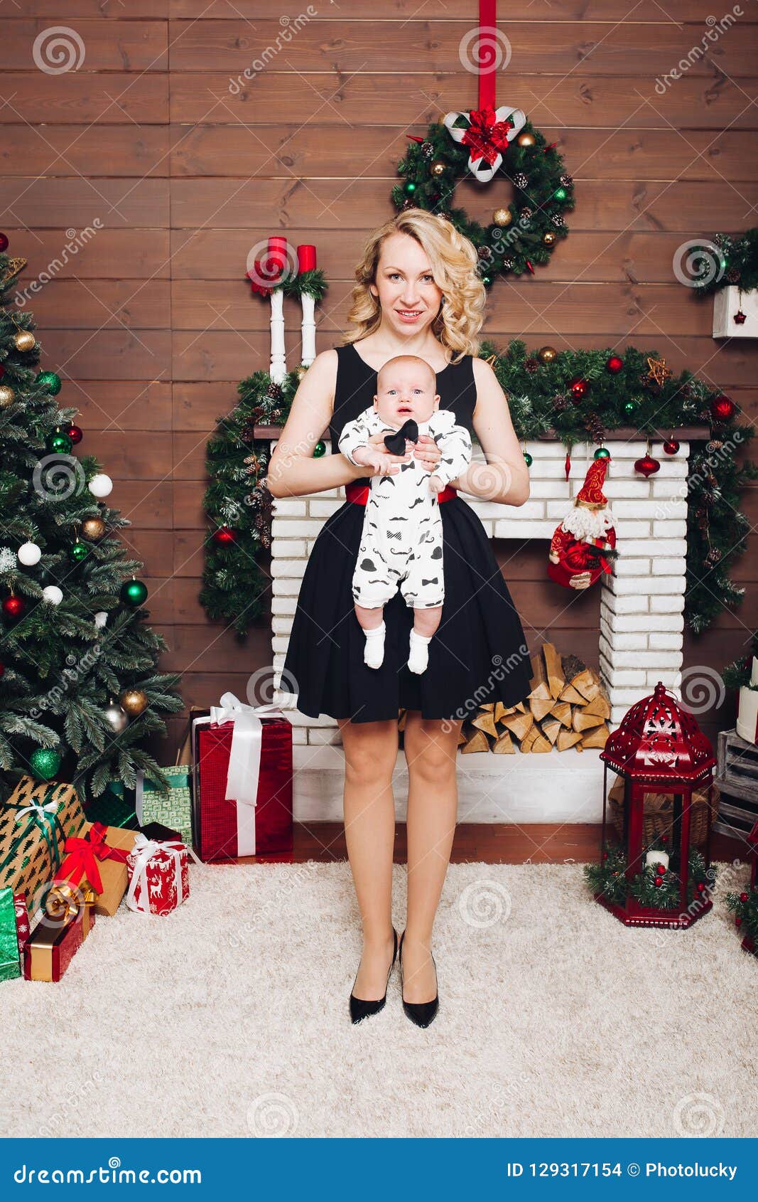 https://thumbs.dreamstime.com/z/boy-beautiful-blonde-mom-embracing-decorated-studio-christmas-positive-little-cute-stylish-holiday-lovely-mother-129317154.jpg