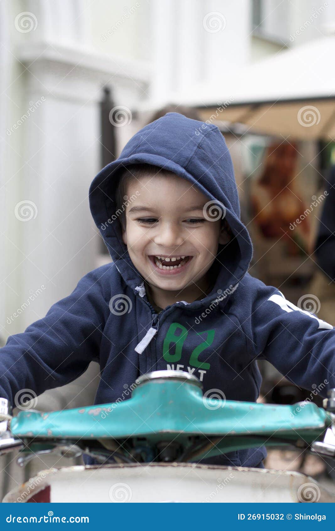 Boy on bike stock photo. Image of brown, hoodie, blue 26915032