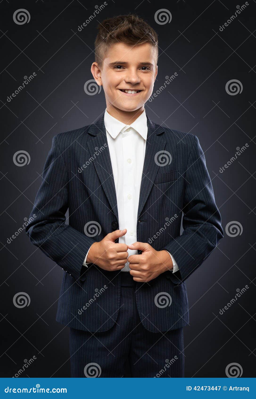 Boy in a Black Suit Jacket Corrects Stock Image Image of hand, costume 42473447