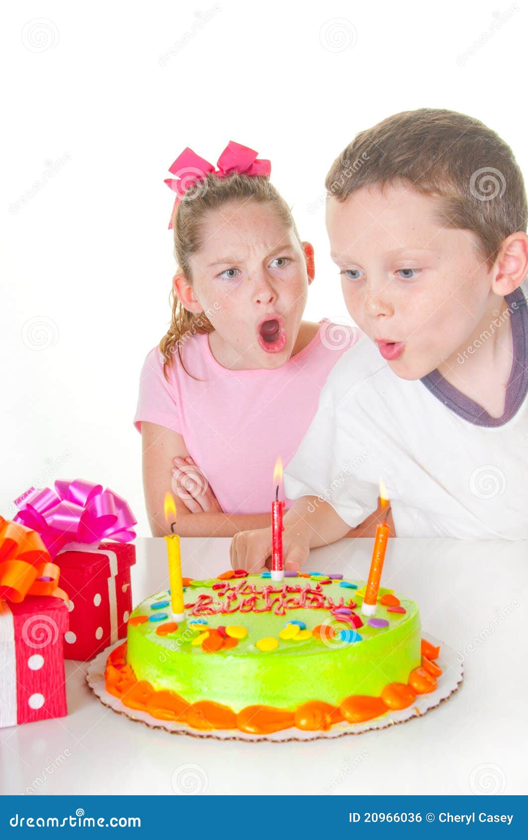 Boy Blowing Out Girl S Candles Stock Photo Image Of Icing Dessert