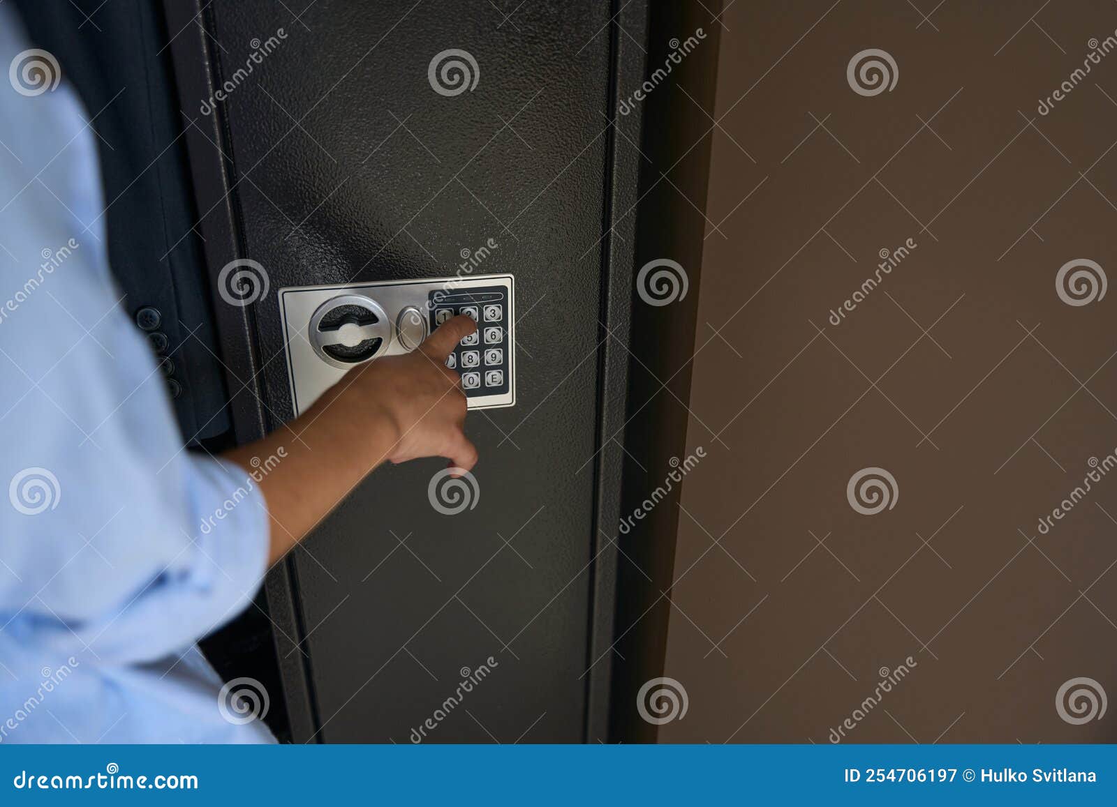 Boy Presses the Buttons on the Gun Safe Stock Image Image of door