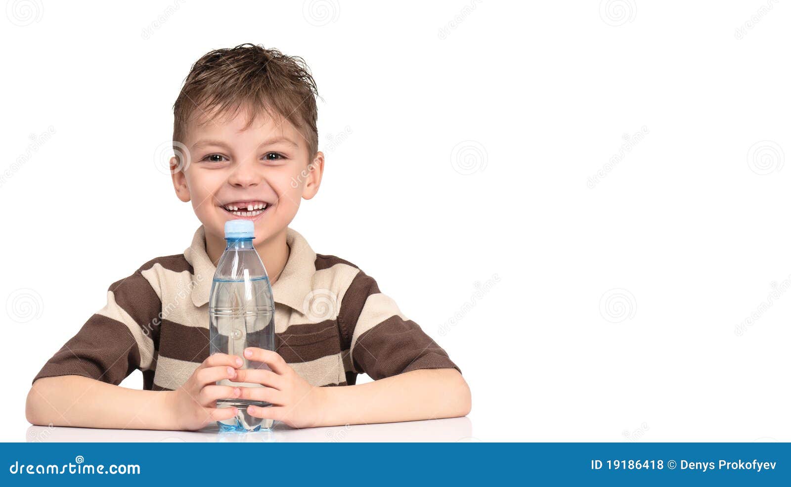 Boy with a bottle of water stock photo. Image of refreshment 19186418