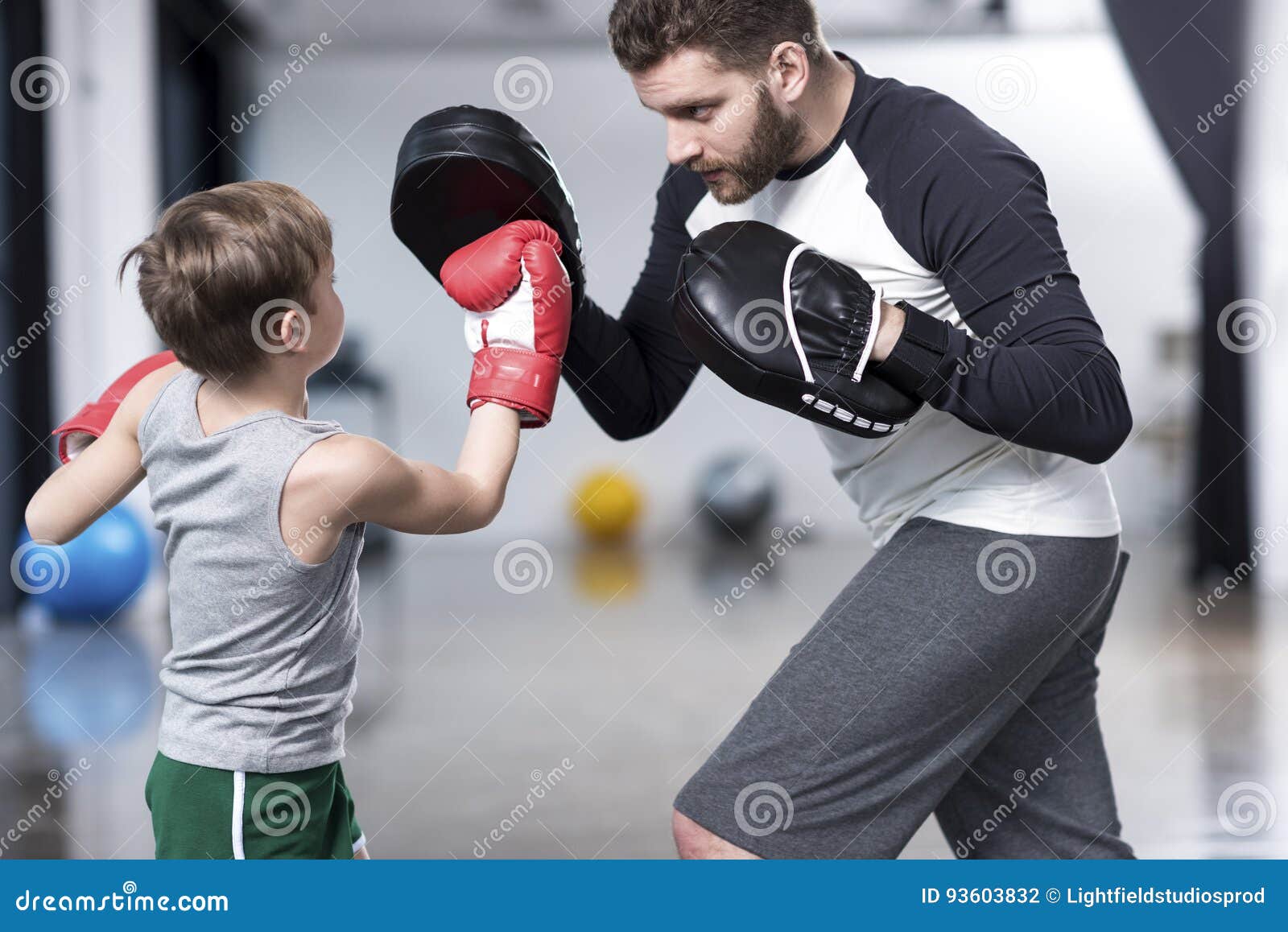 Boy Boxer Practicing Punches with Coach Stock Photo Image of focus