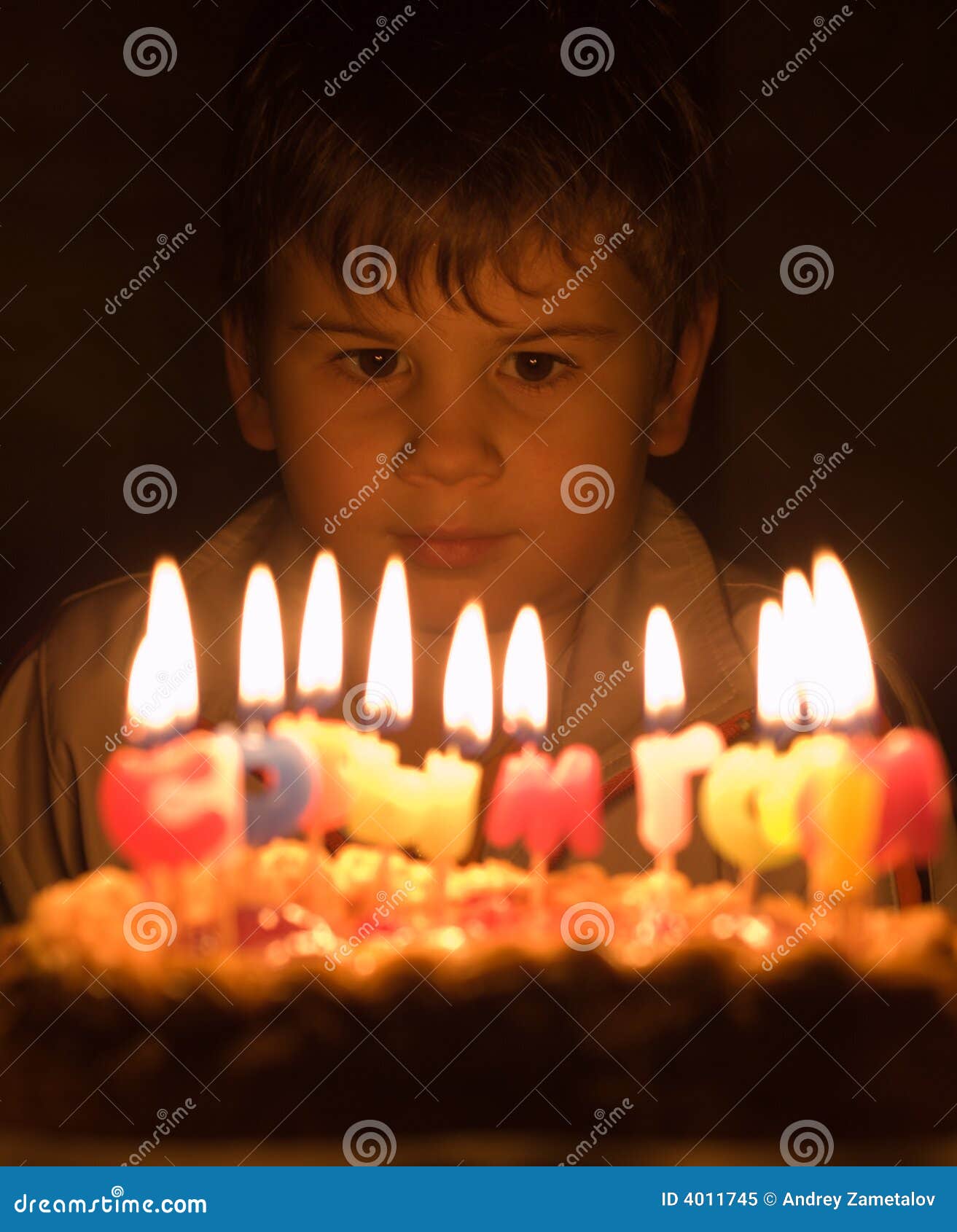 Boy and burning candles stock image. Image of sight, burn 4011745